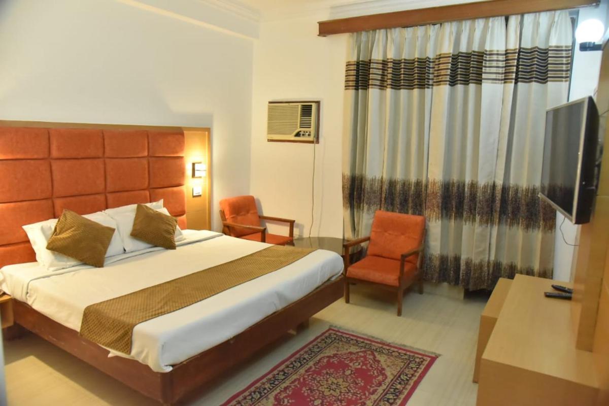 Deluxe Room - Photo 1