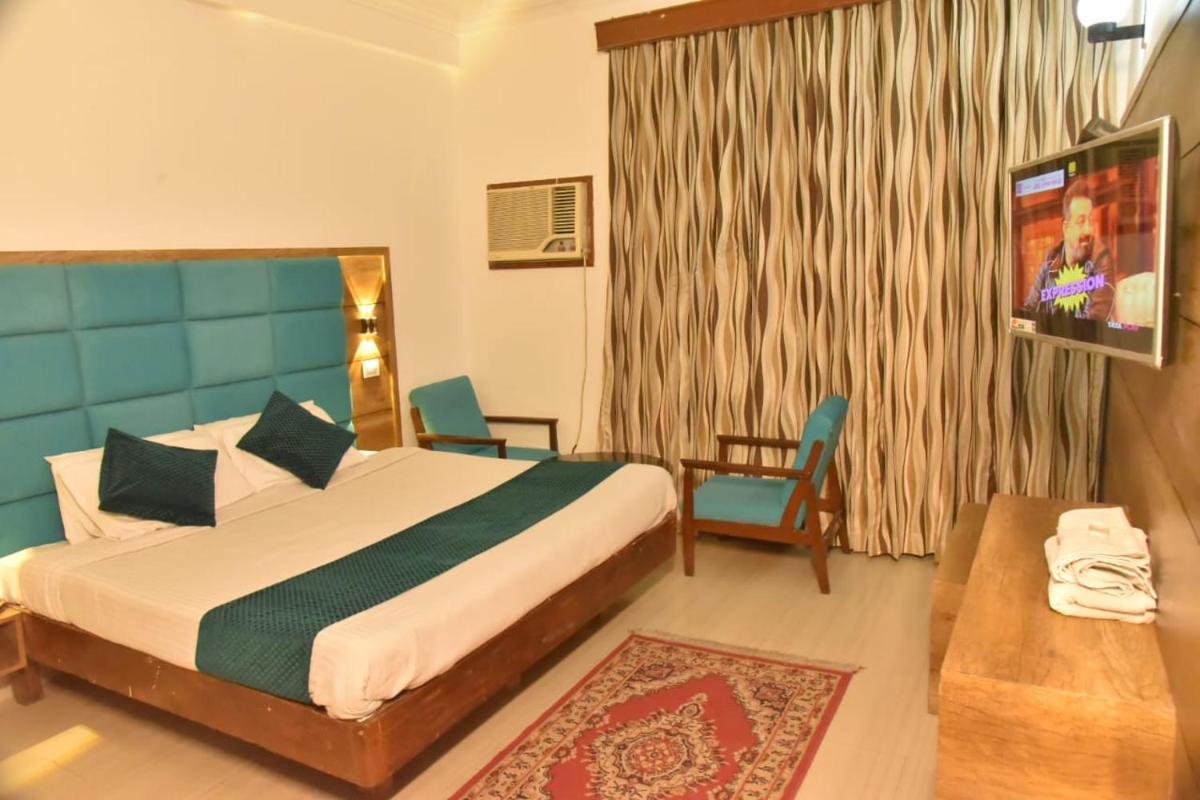 Deluxe Room - Photo 5