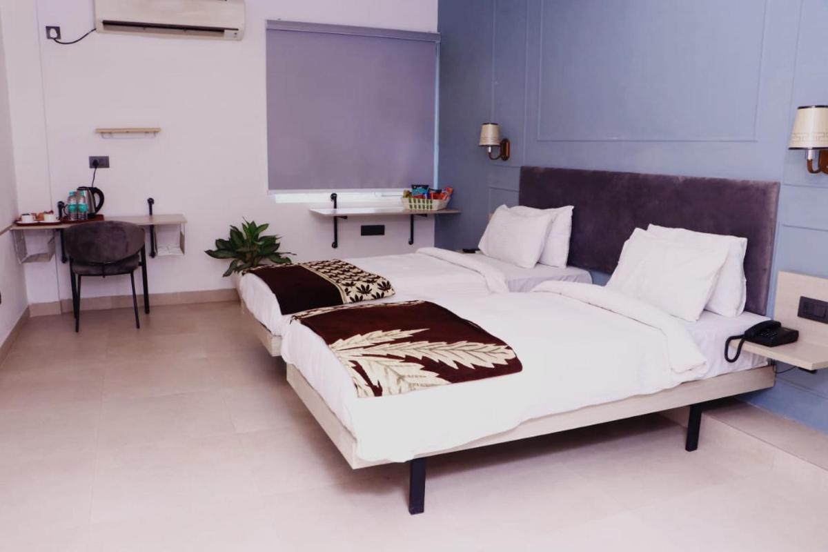 Deluxe Twin Room - Photo 9