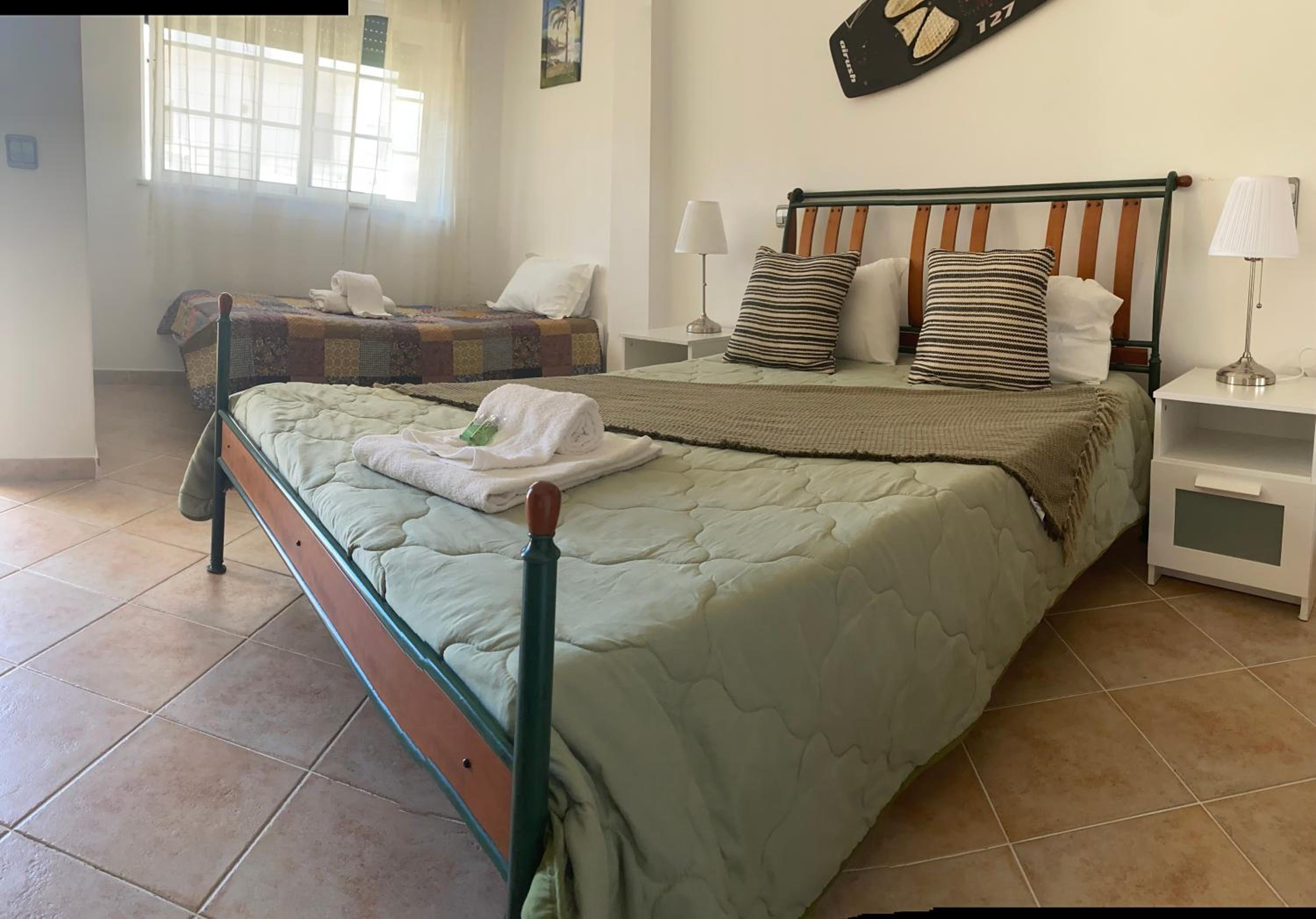 Basic Triple Room with Shared Bathroom photo 2