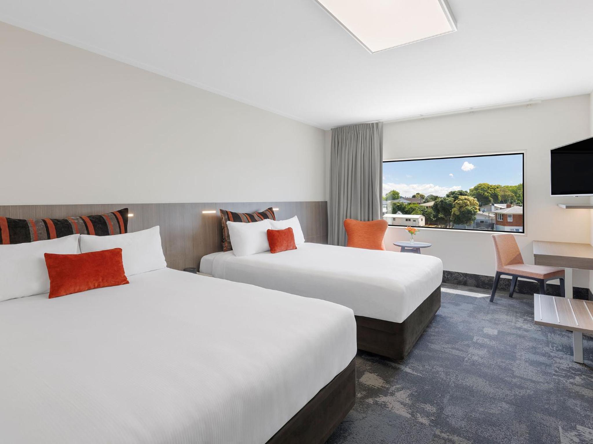Deluxe Twin Room with Two Queen Beds - Photo 1