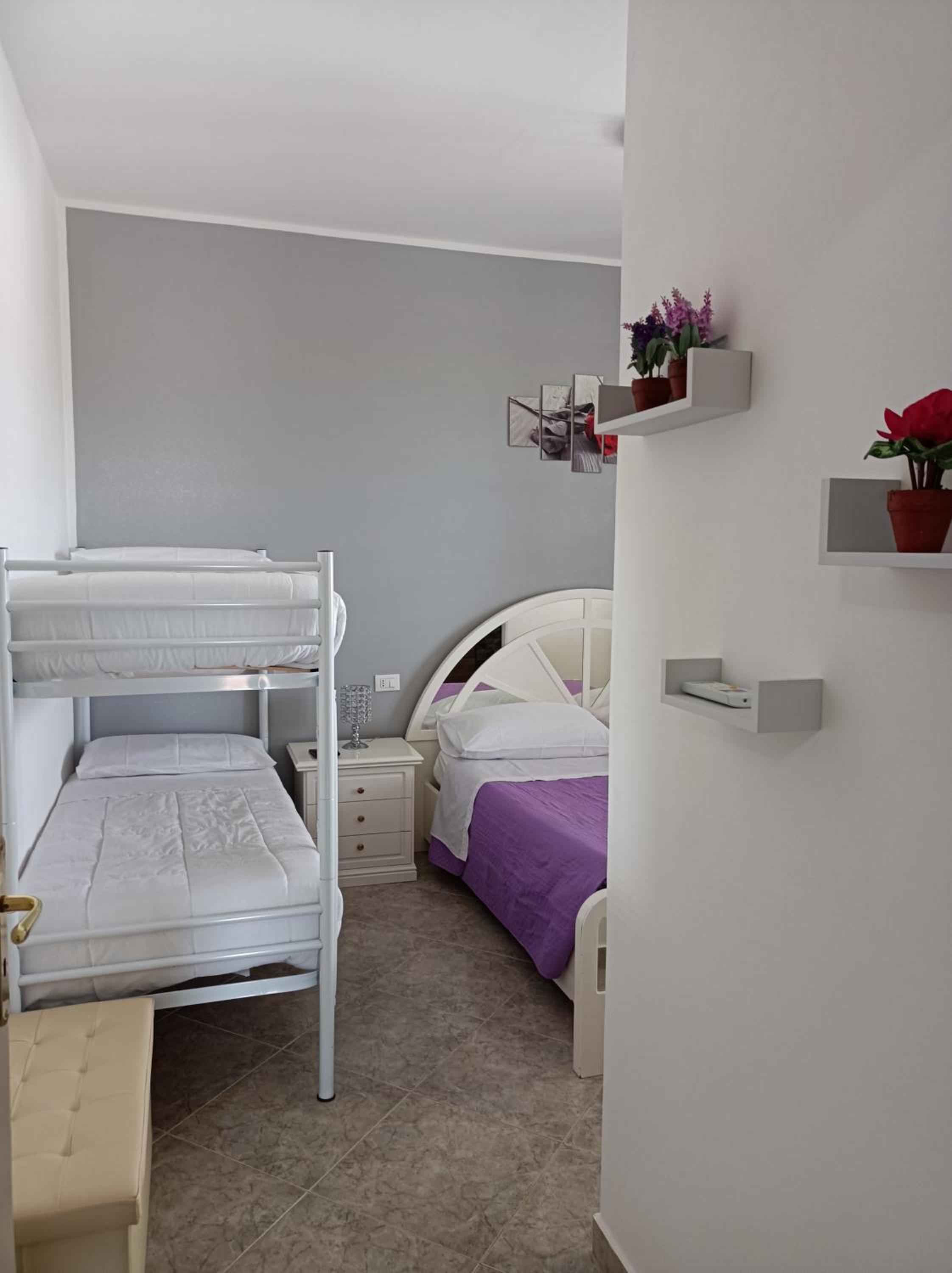 Deluxe Quadruple Room - Photo 1