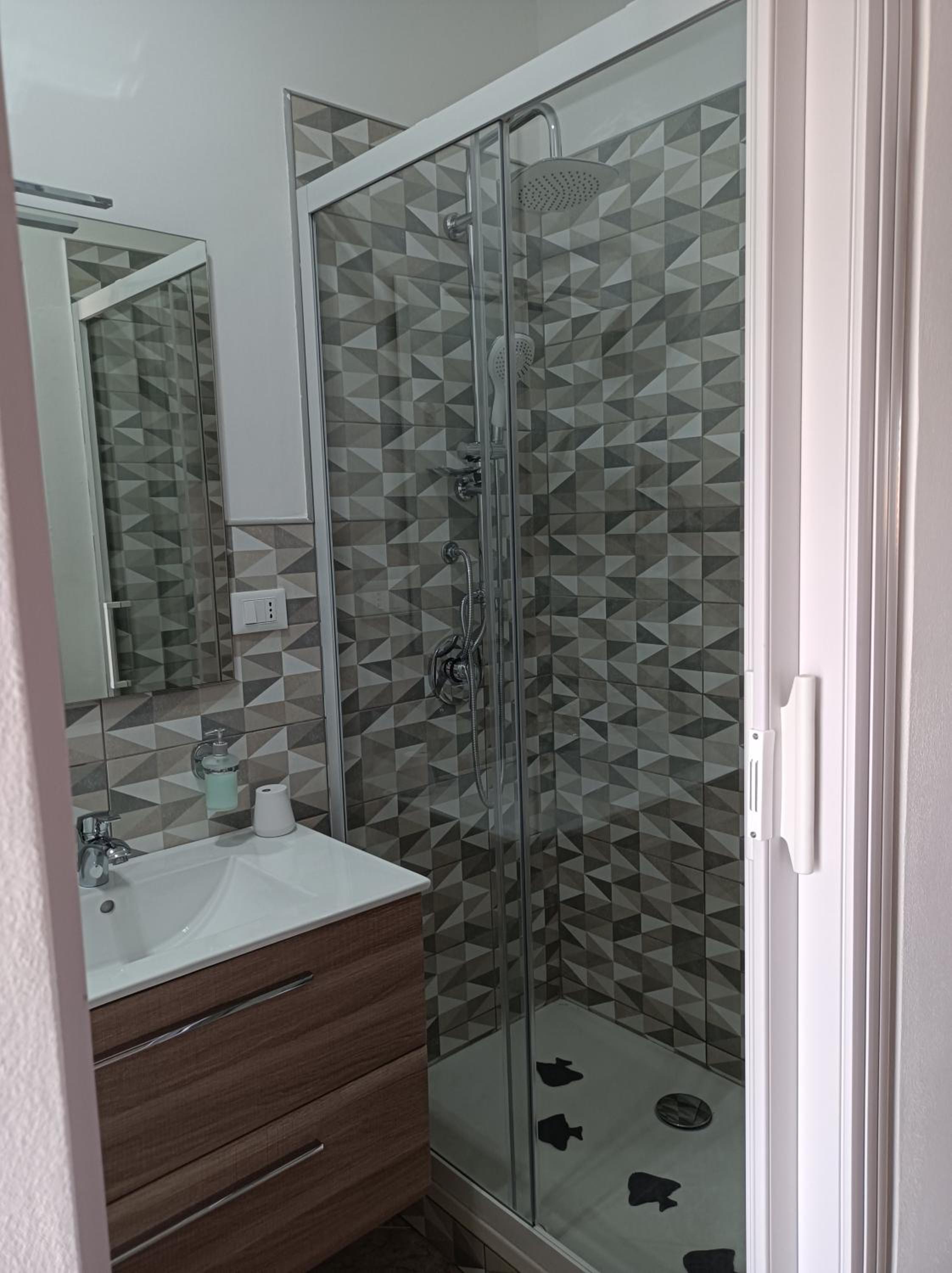 Deluxe Quadruple Room - Photo 12