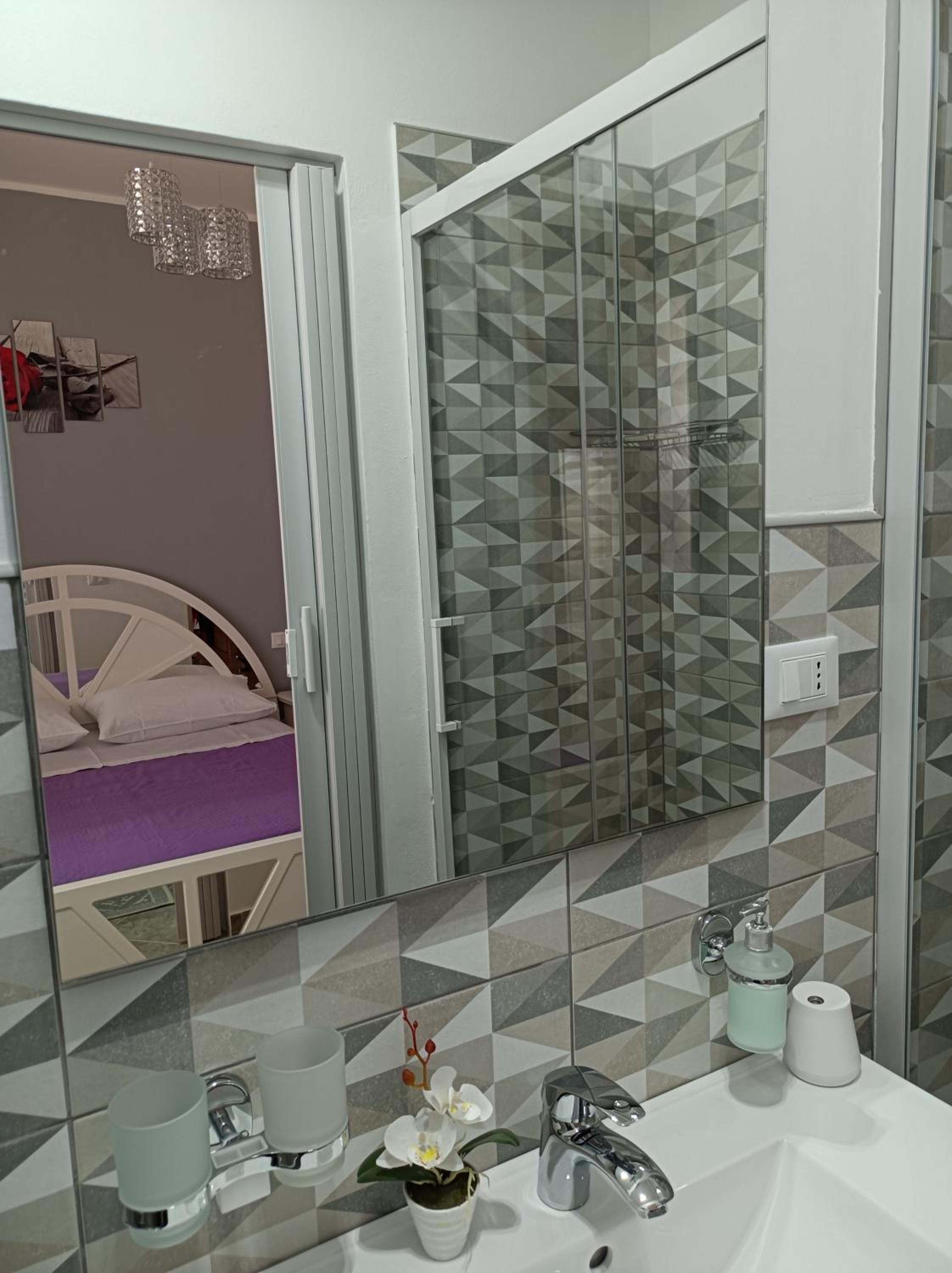 Deluxe Quadruple Room - Photo 11