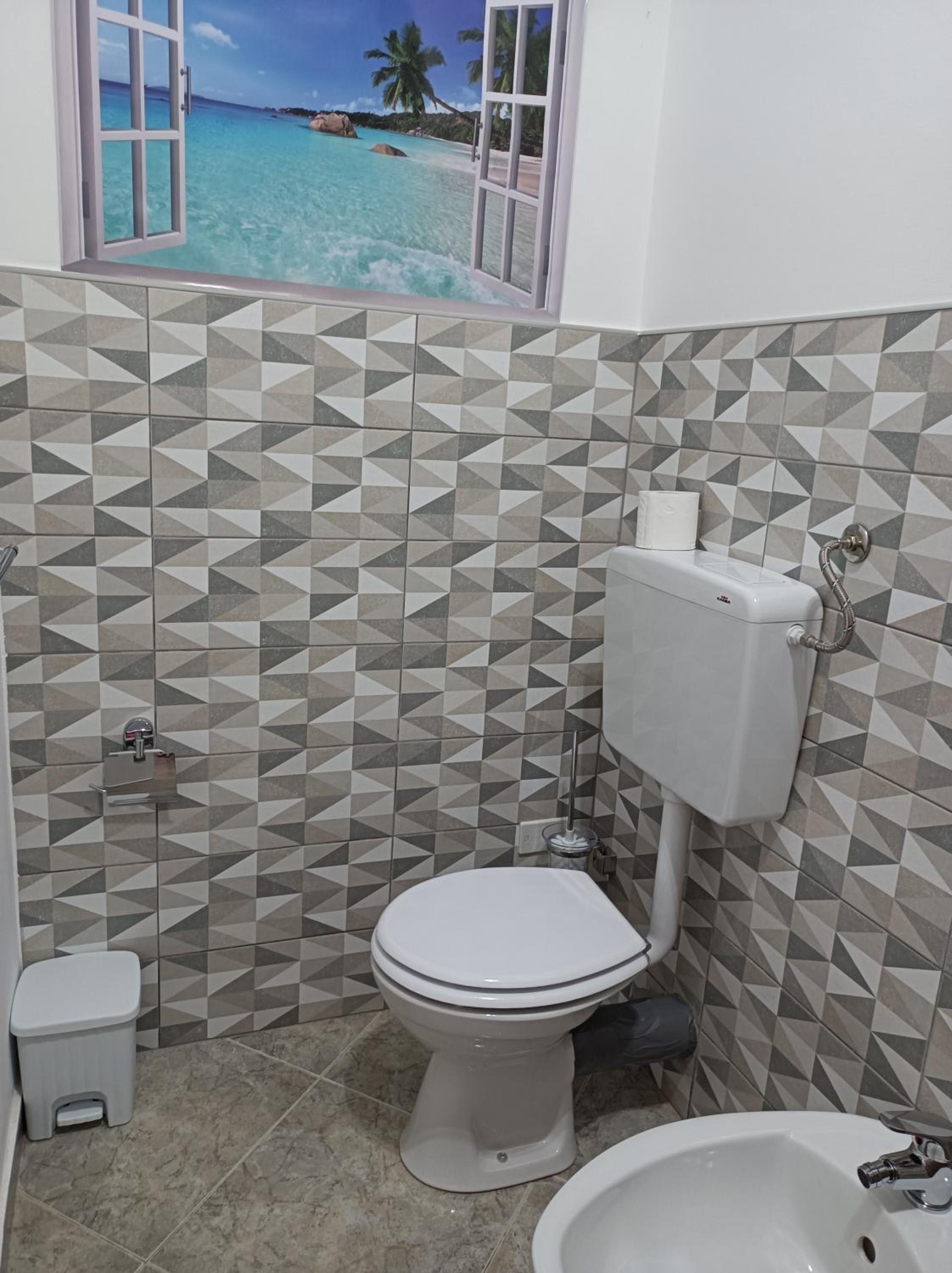 Deluxe Quadruple Room - Photo 10