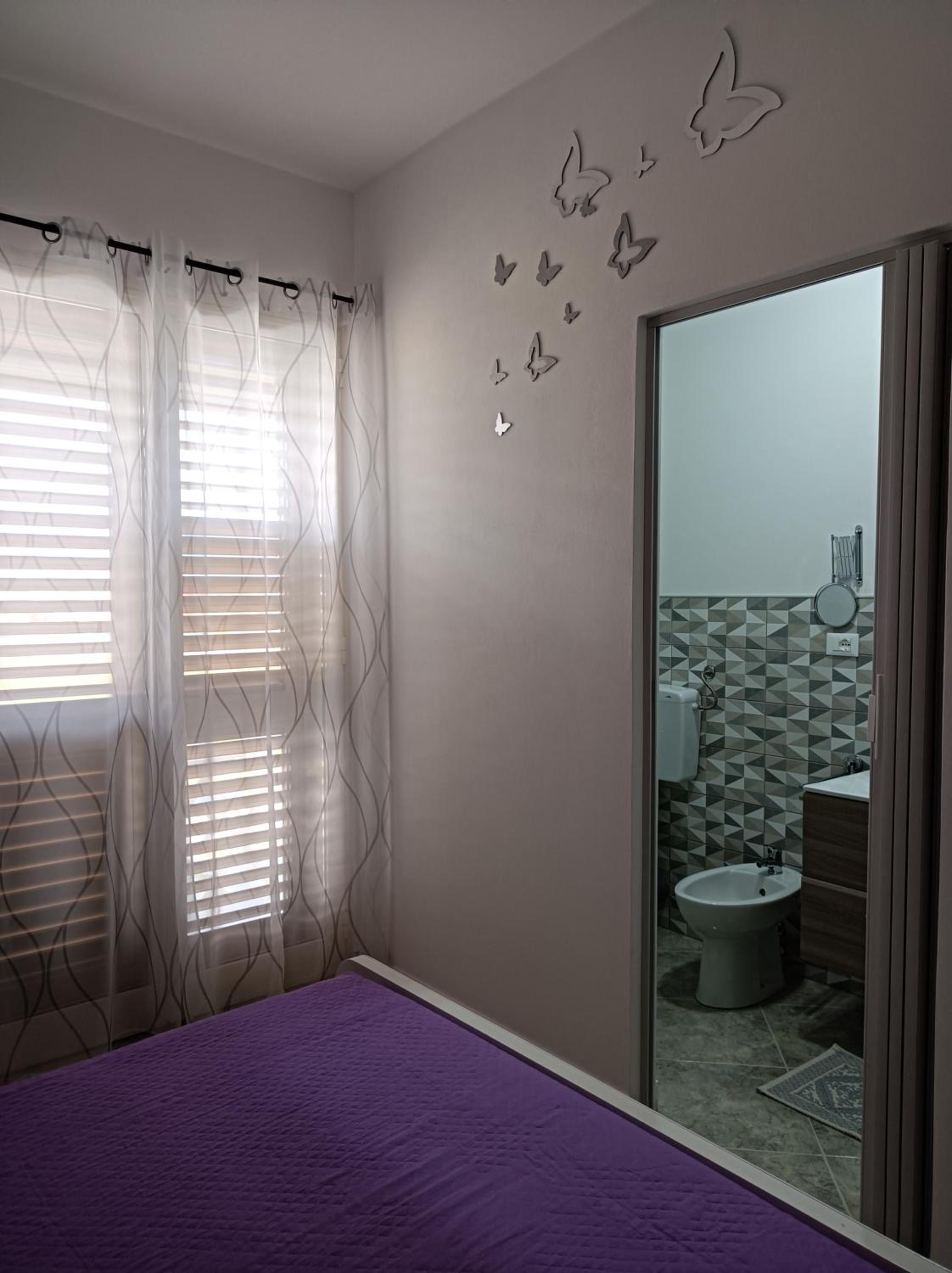 Deluxe Quadruple Room - Photo 8