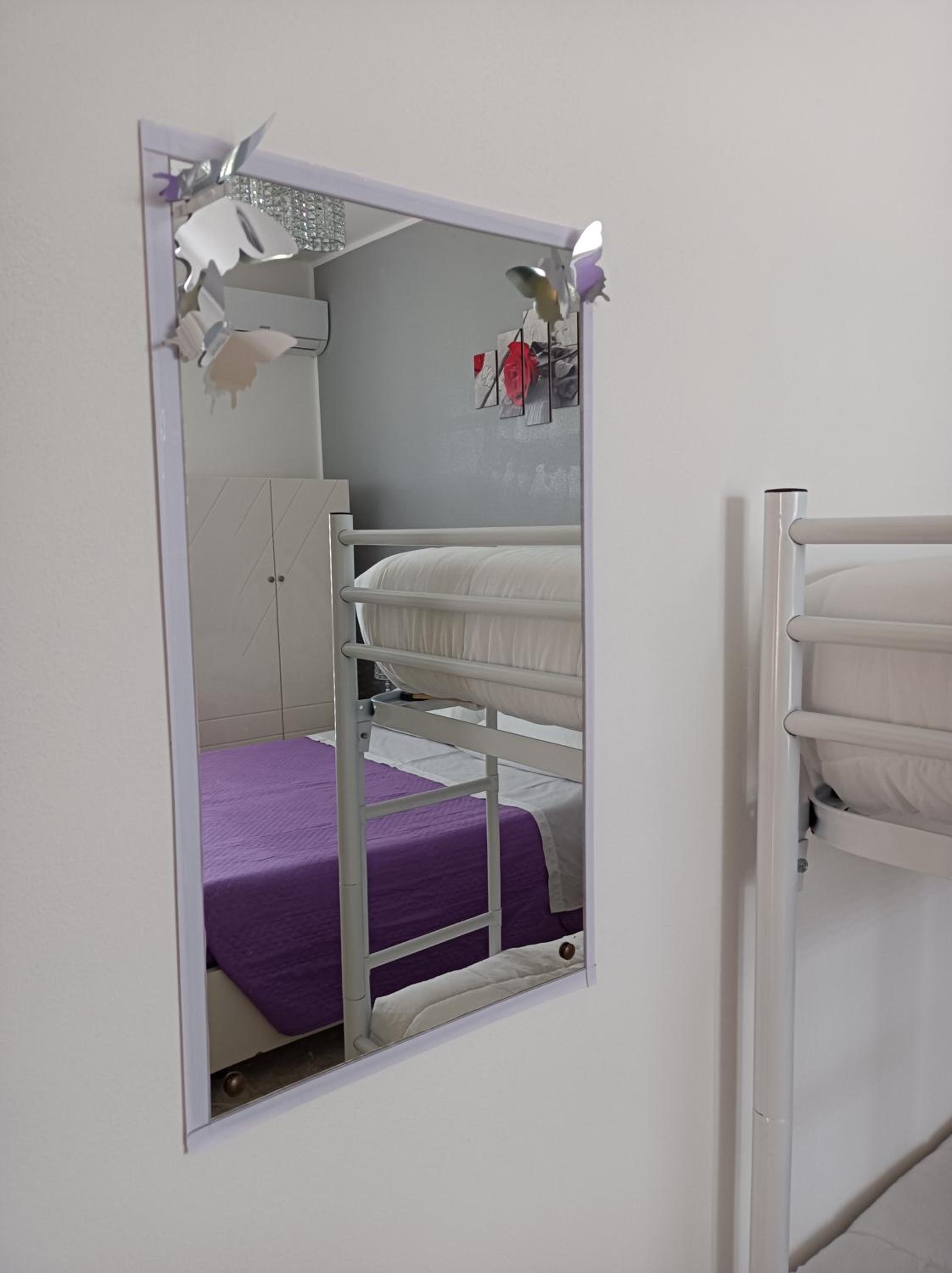 Deluxe Quadruple Room - Photo 7