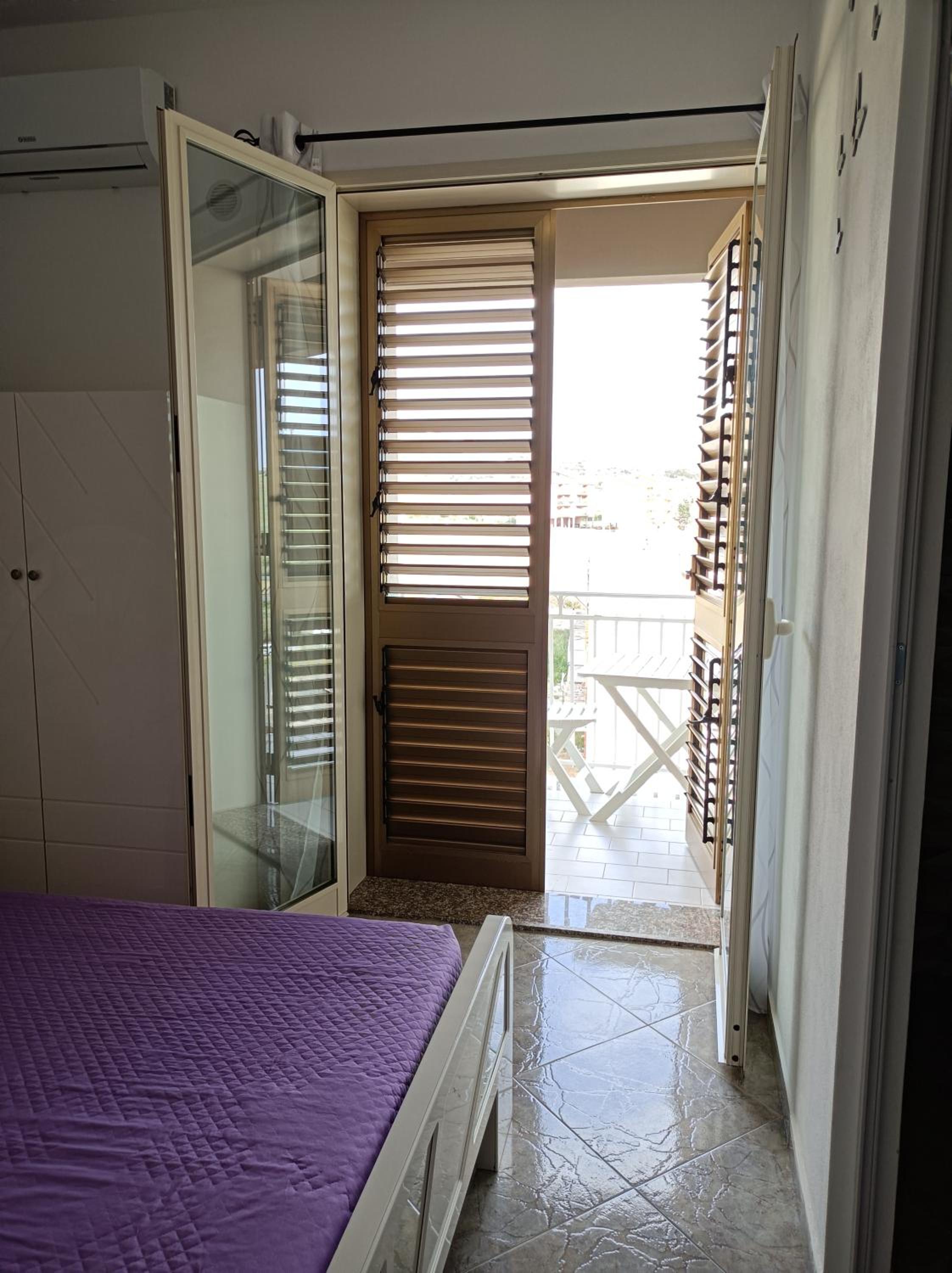 Deluxe Quadruple Room - Photo 6