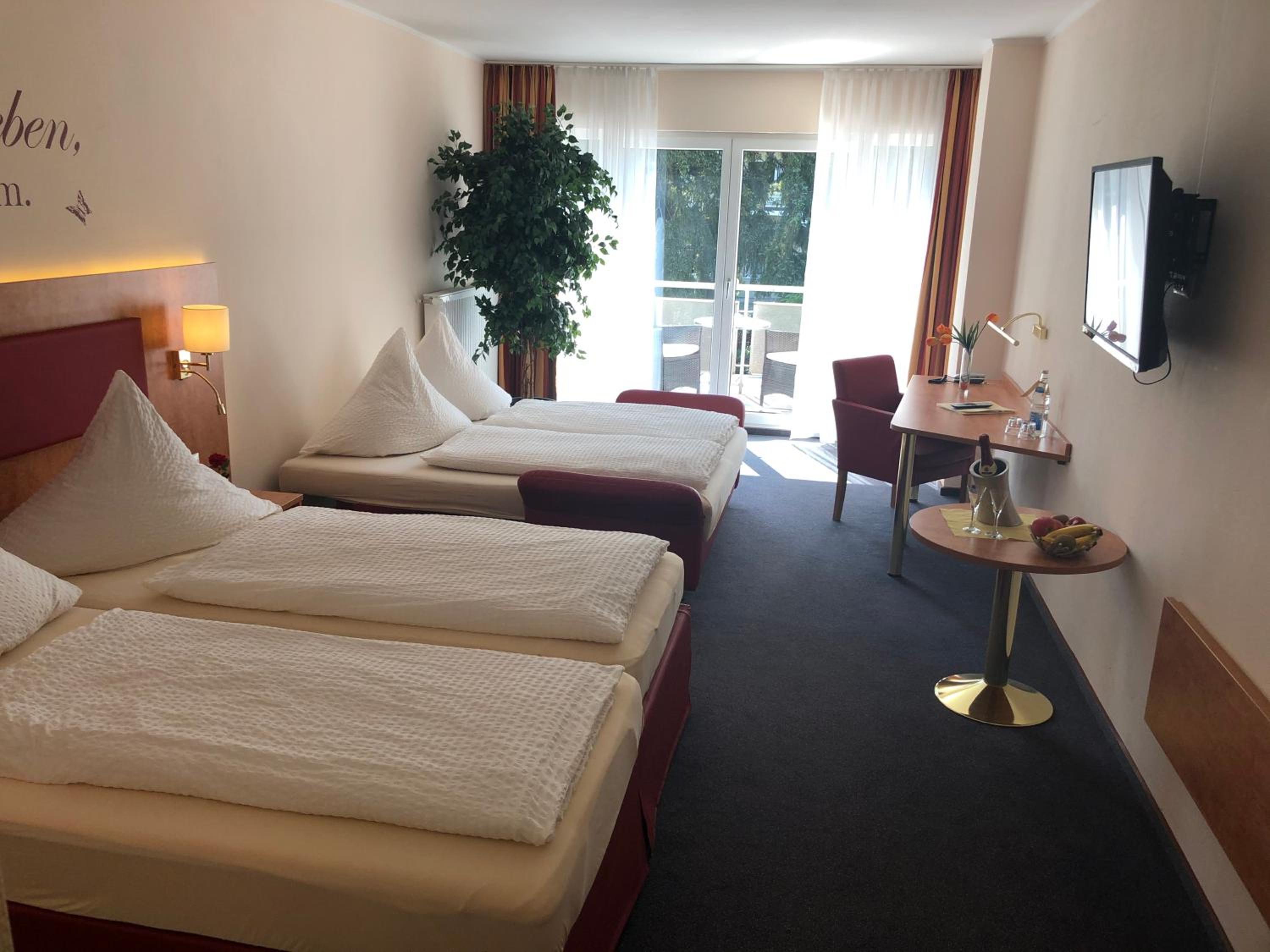 Quadruple Room with Balcony photo 3