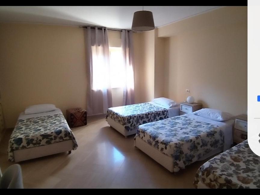 Quadruple Room with Private Bathroom