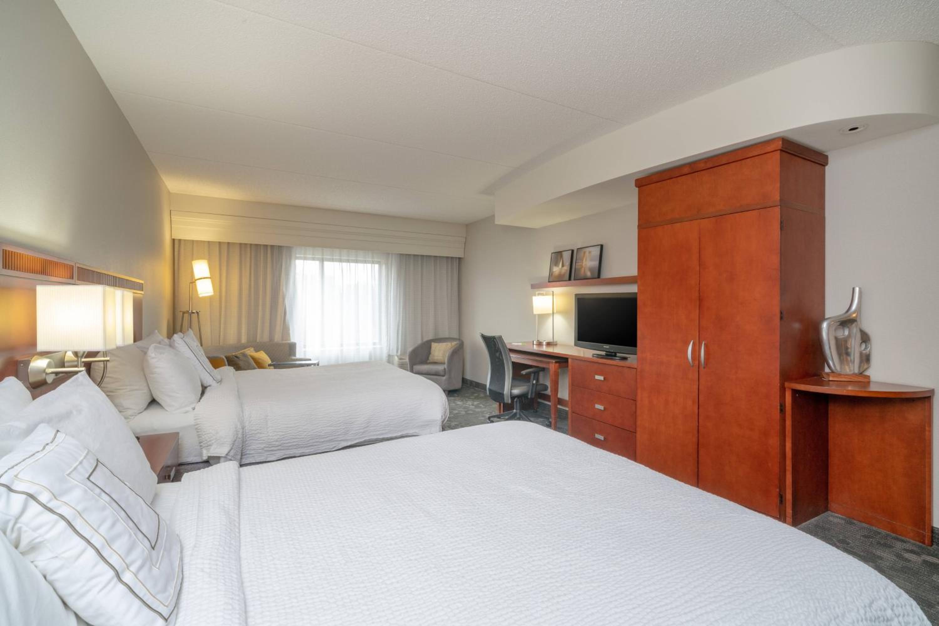 Queen Room with Two Queen Beds - Photo 1