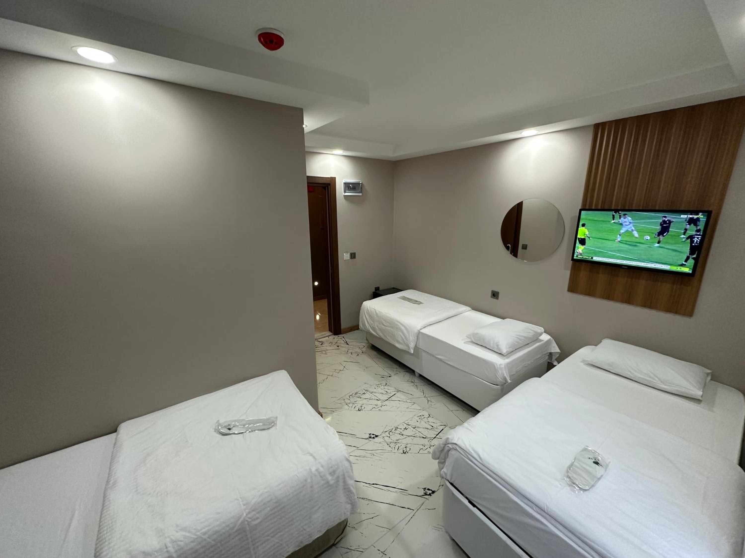 Economy Triple Room - Photo 1