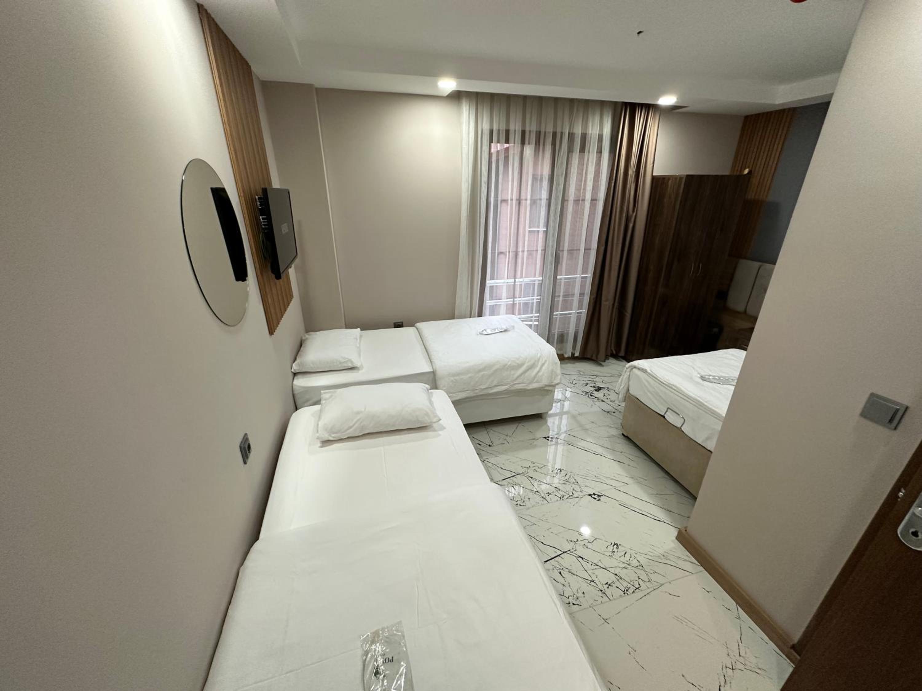 Economy Triple Room - Photo 3