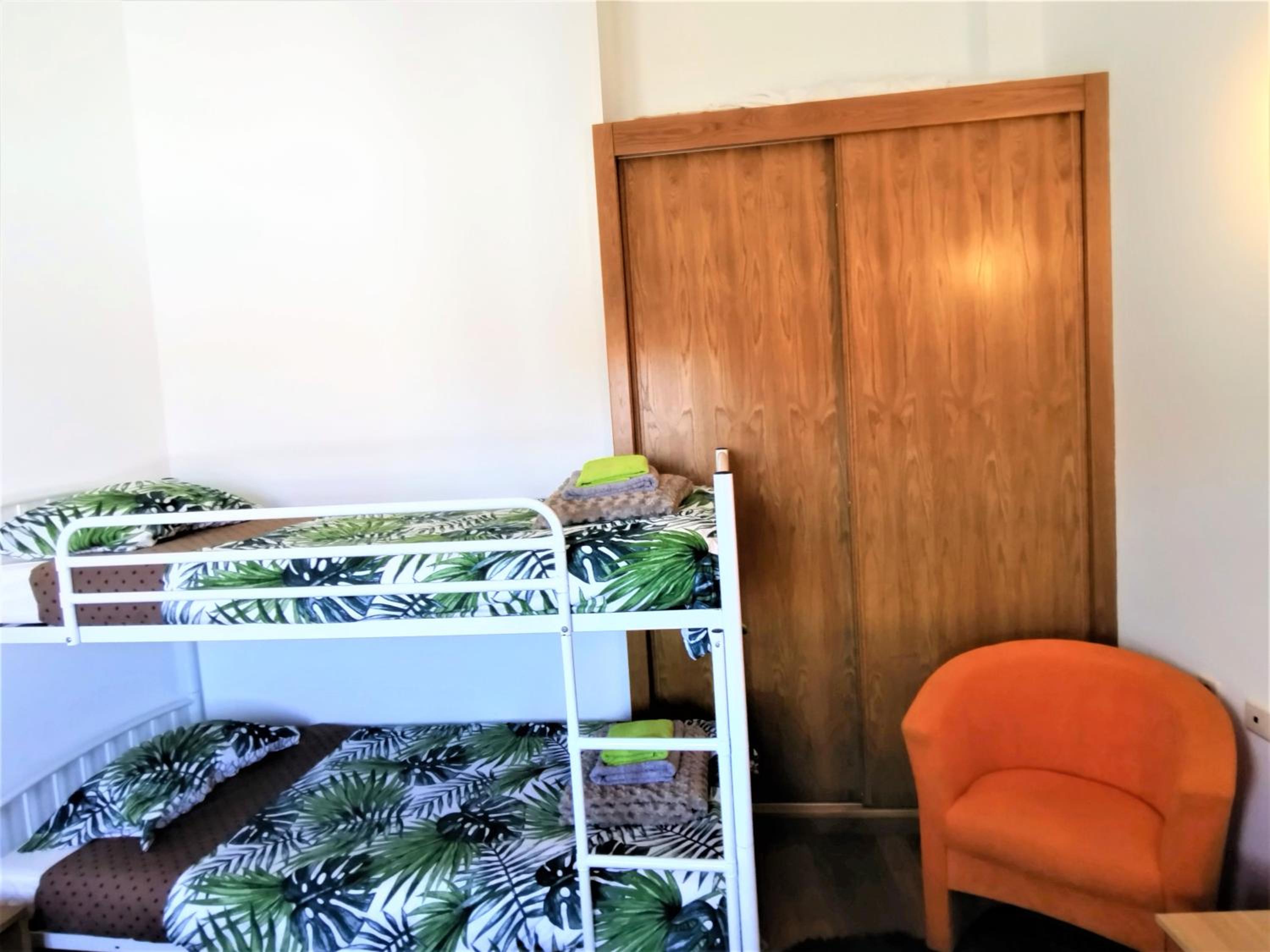 Basic Triple Room with Shared Bathroom photo 1