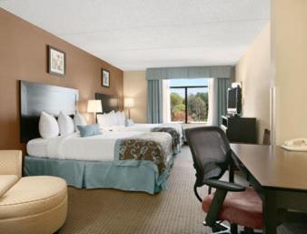 Queen Room with Two Queen Beds- Non-Smoking - Photo 1
