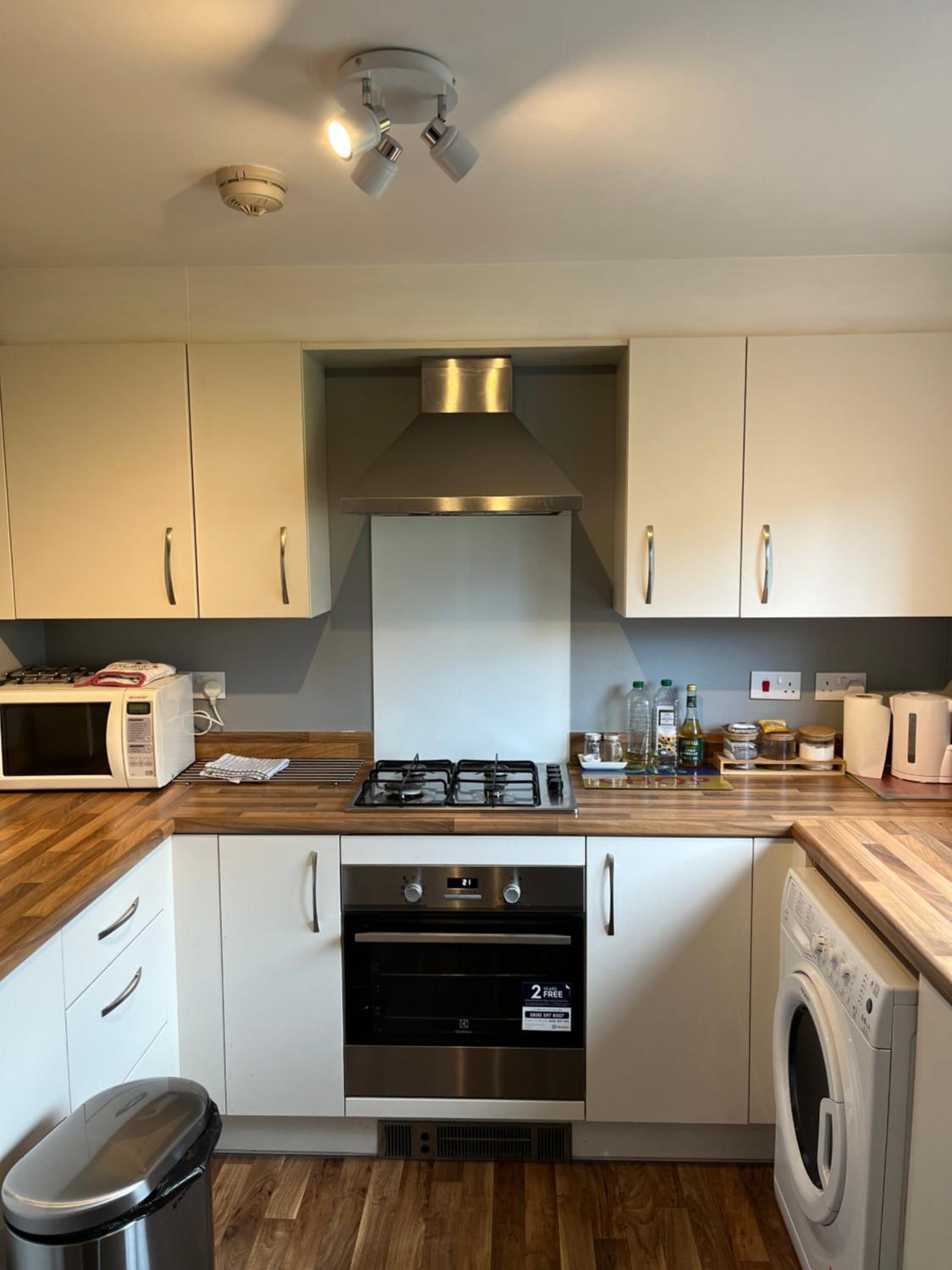 Three-Bedroom House - Photo 16