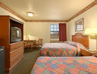 Queen Room with Two Queen Beds - Smoking - Photo 1