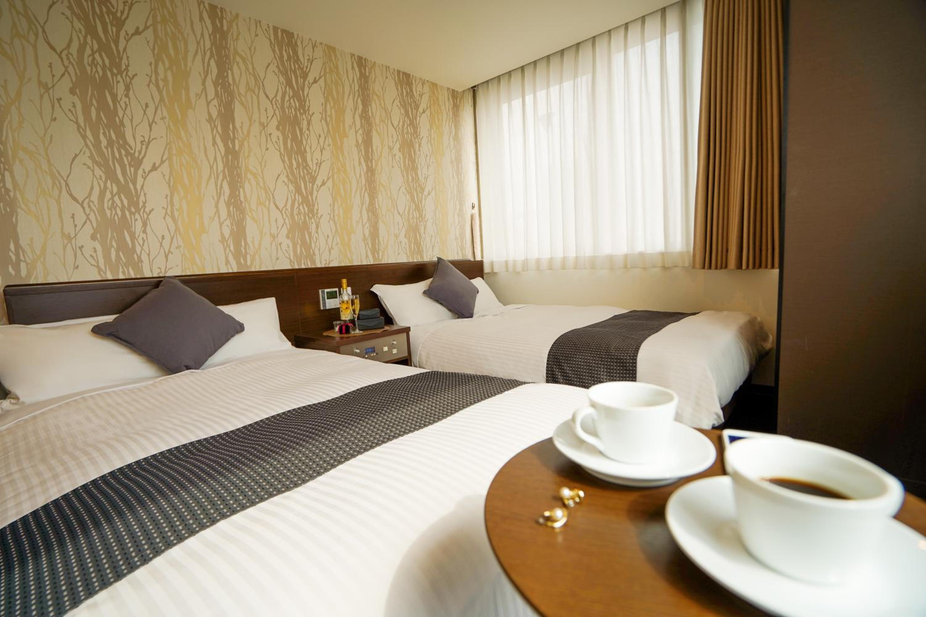 Standard Twin Room - Smoking (E-Cigarets Only) - Photo 1
