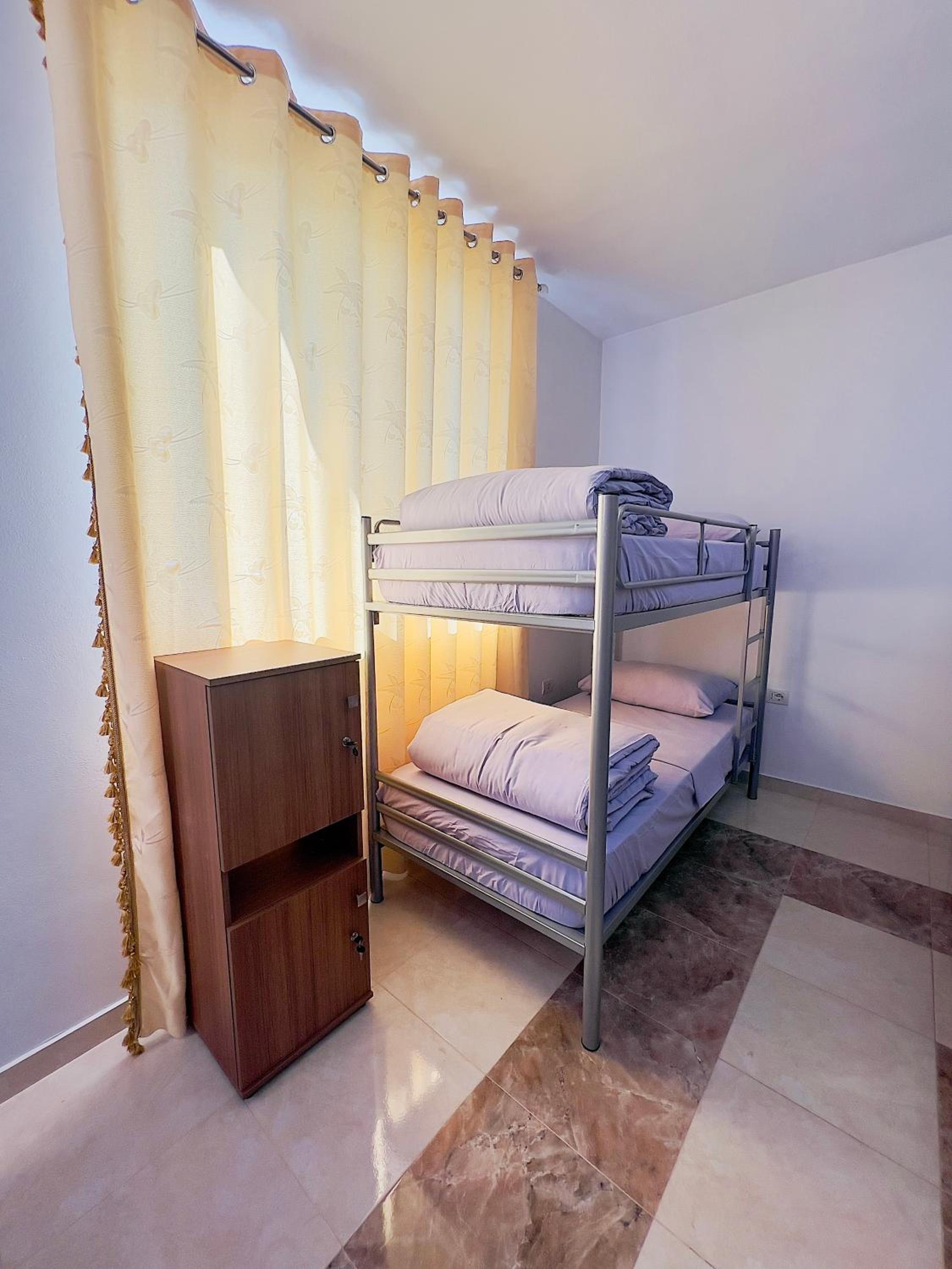 Bed in 4-Bed Dormitory Room photo 1
