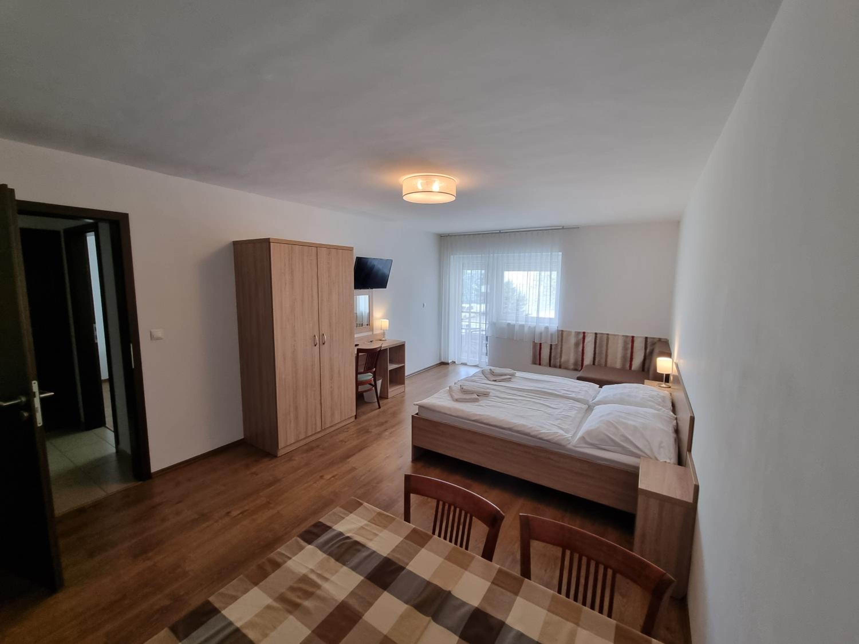 Two-Bedroom Apartment with Balcony and Lake View