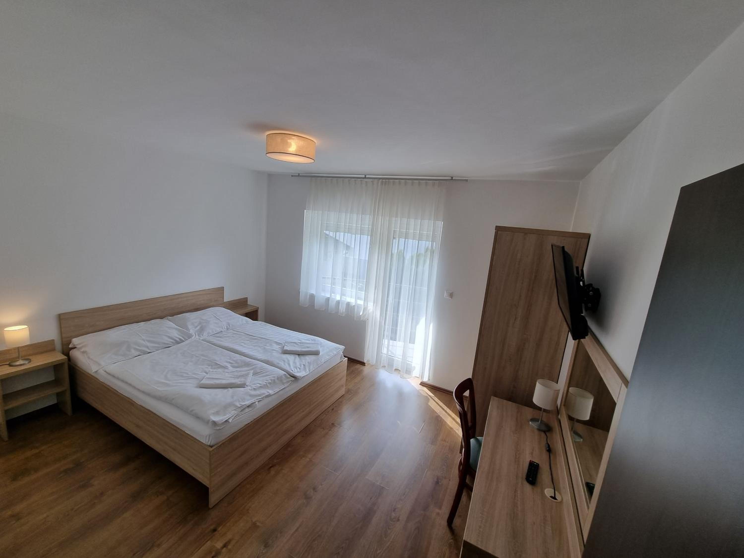 Two-Bedroom Apartment with Balcony