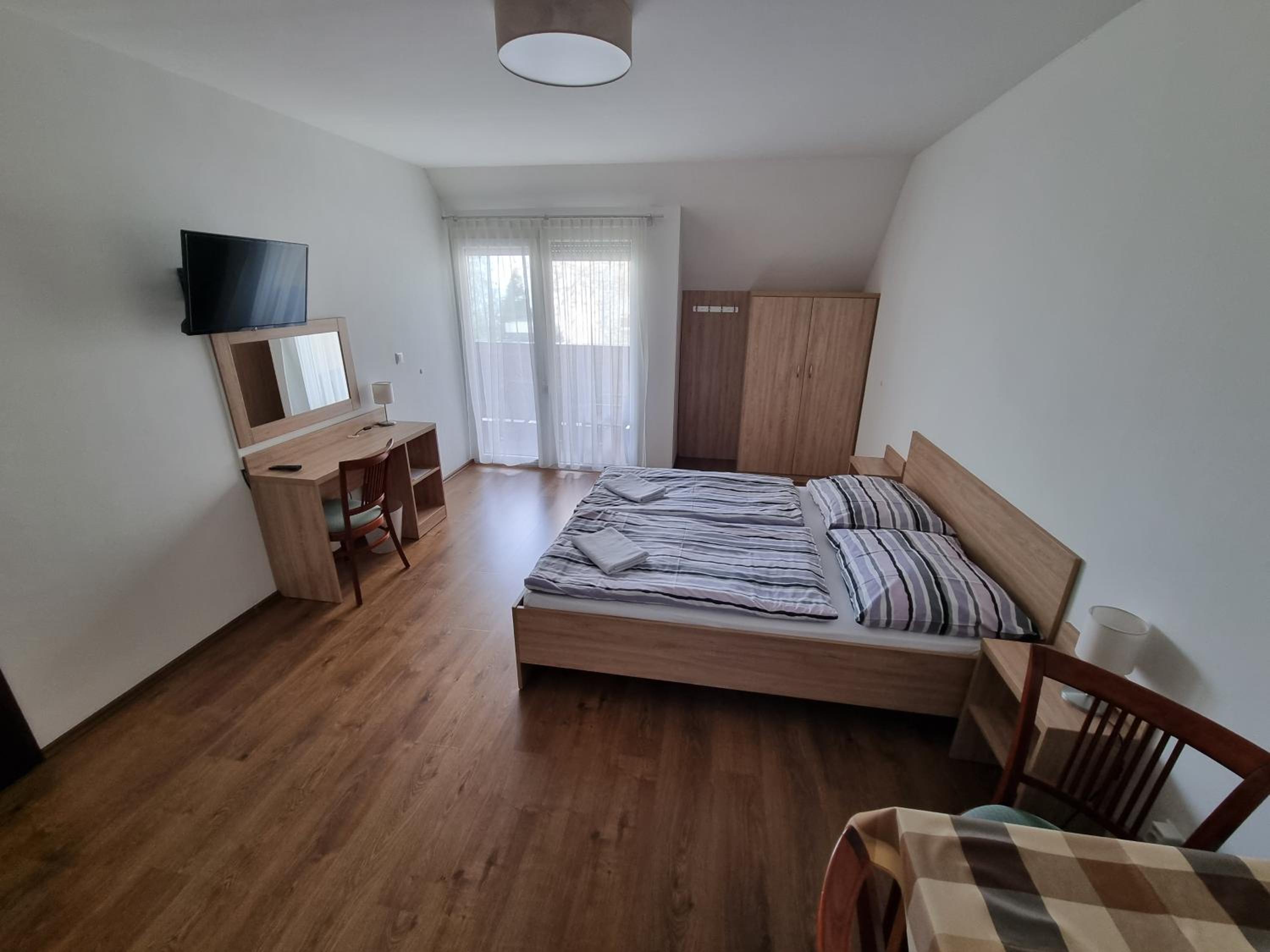 Two-Bedroom Apartment with Terrace and Lake View