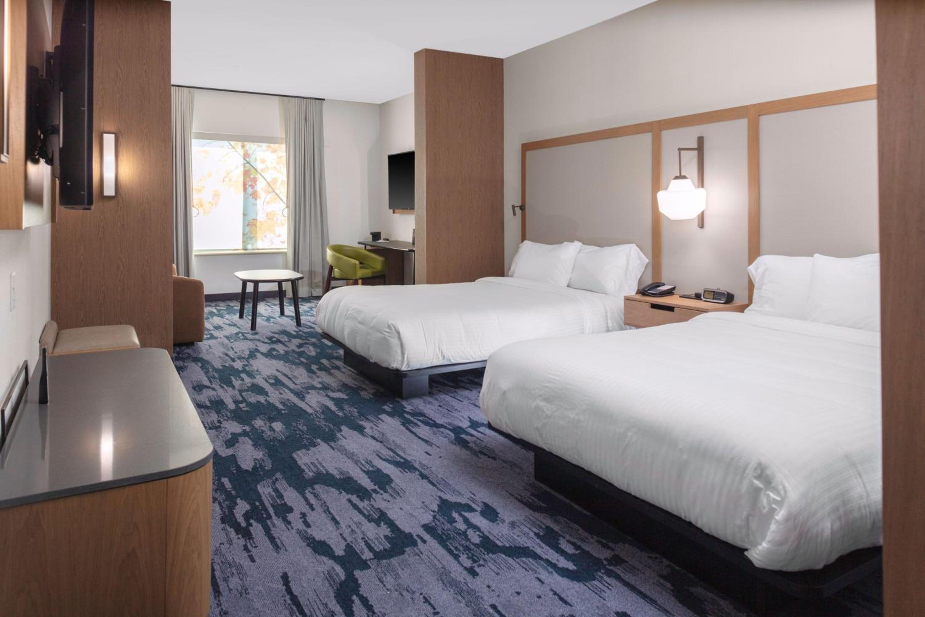 Queen Suite with Two Queen Beds and Sofa Bed - Photo 1
