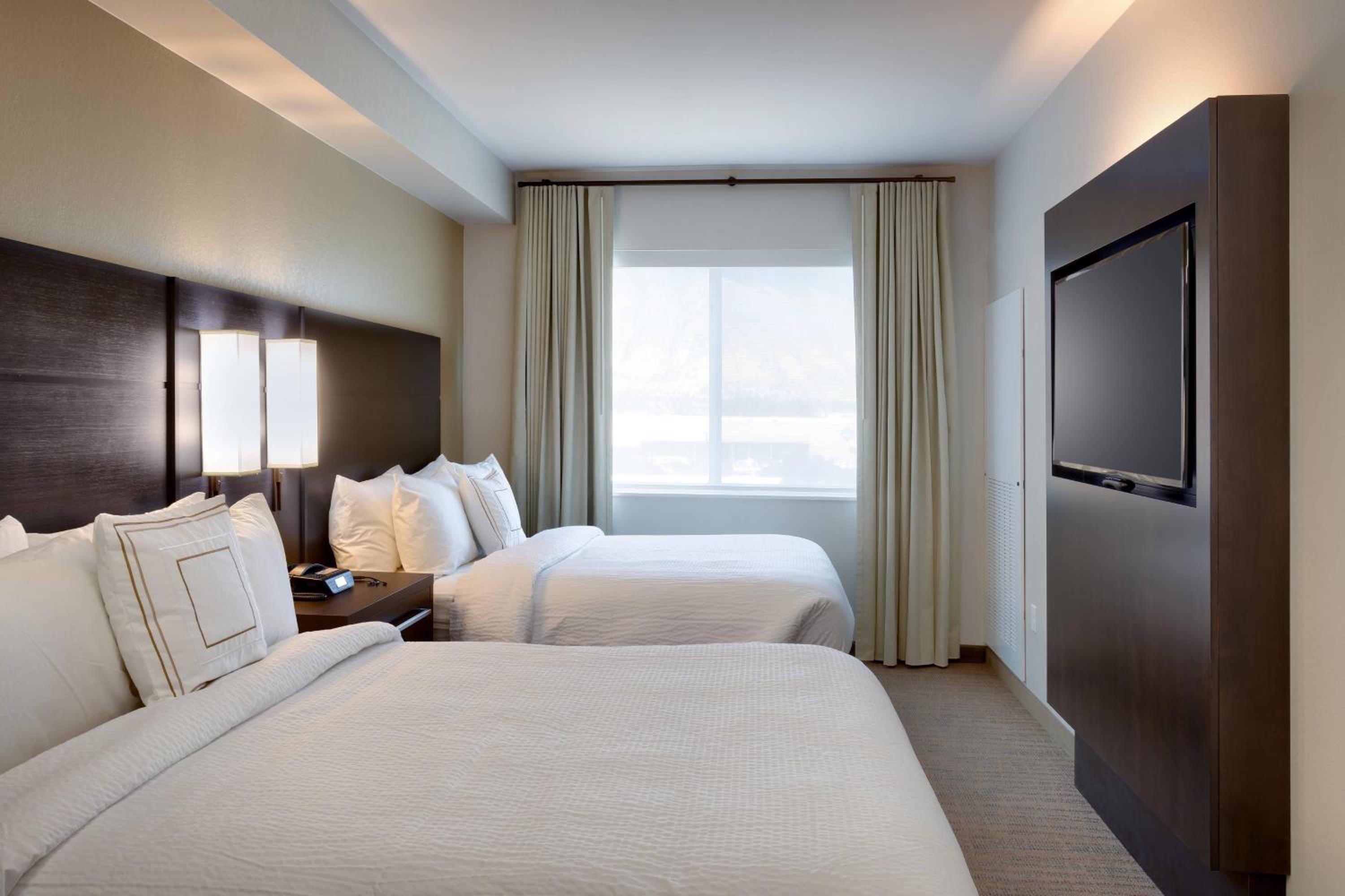 One Bedroom Suite with Two Queen and One Sofa bed