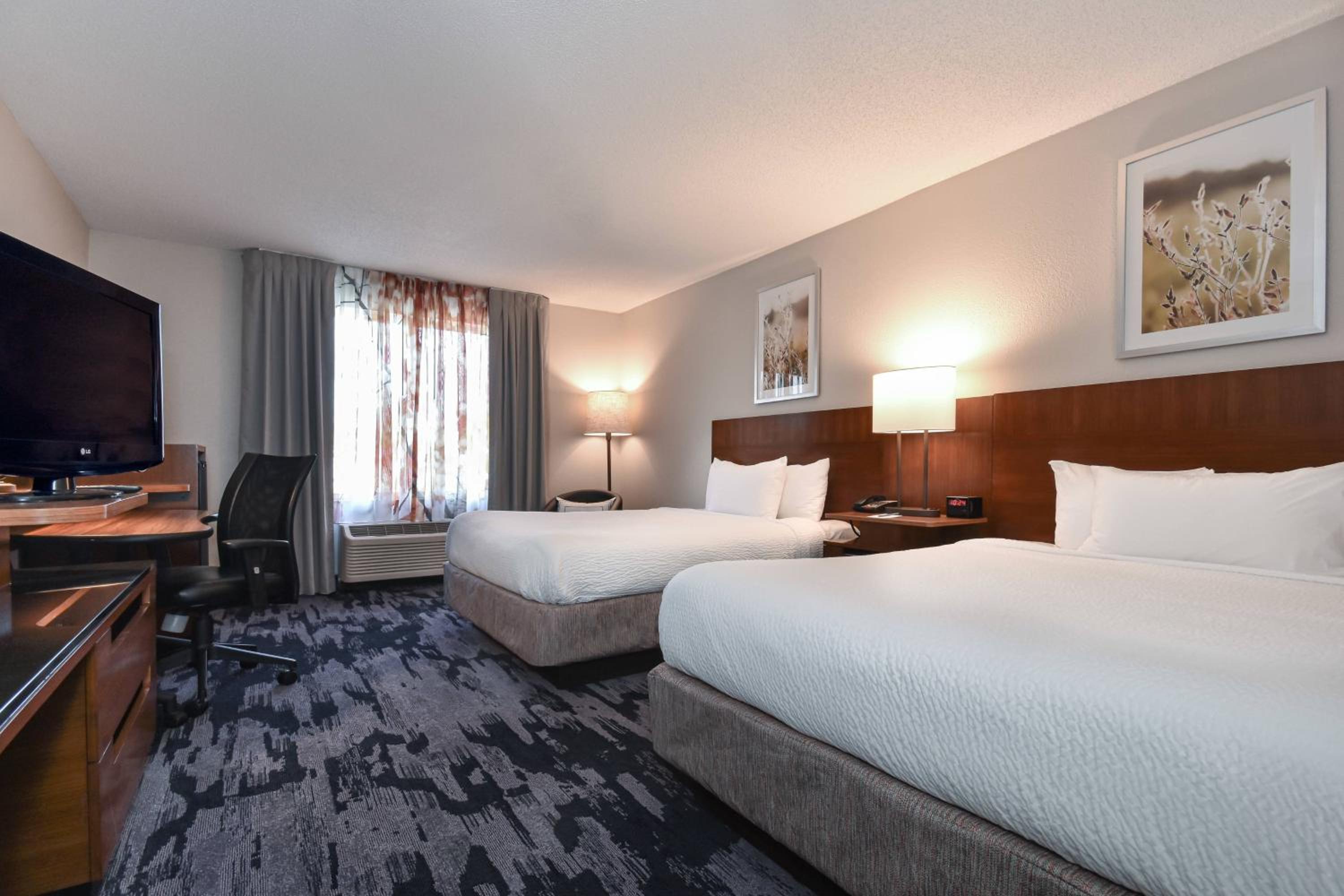 Queen Room with Two Queen Beds - Photo 1