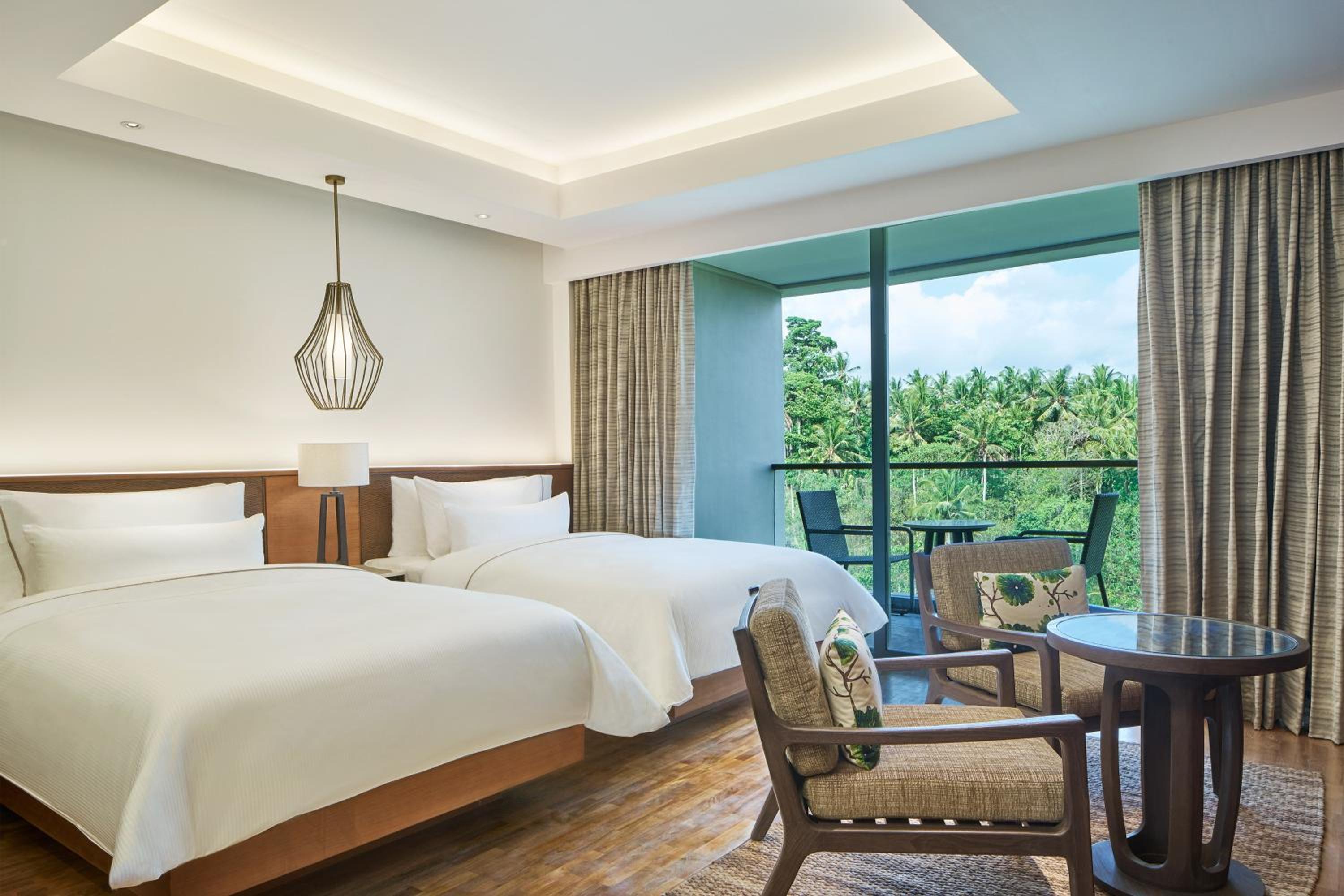 Deluxe Guest Room, 2 Twin Beds, Pool View, and Balcony with FREE Access to the Farm, FREE Family Activities, Daily Yoga, Daily Aquacise, and 24-Hour Access to the Westin WORKOUT®️ Fitness Studio.