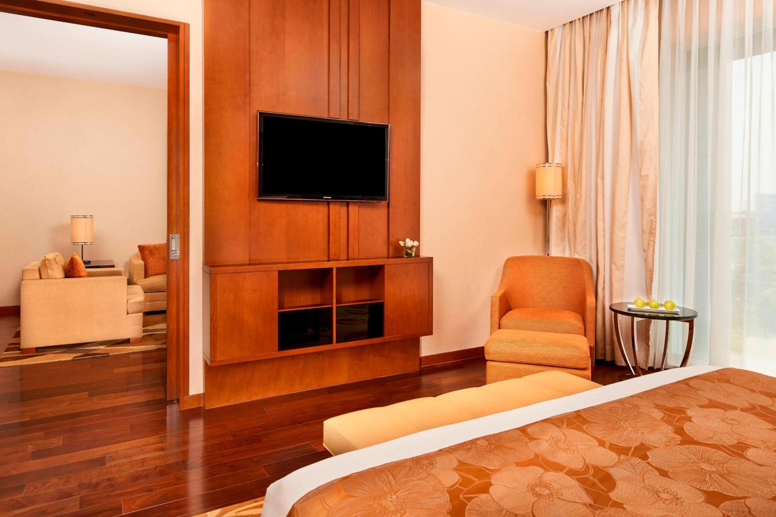 Deluxe Suite with complimentary airport transfers, Happy Hours, Executive Lounge Access.INR 500 hotel credit inclusive of IRD (In-Room Dining) per room per night Two way Airport Transfers Access to Taberna Bar with unlimited beverages for two hours (5PM – Deluxe Suite with complimentary airport transfers, Happy Hours, Executive Lounge Access.INR 500 hotel credit inclusive of IRD (In-Room Dining) per room per night Two way Airport Transfers Access to Taberna Bar with unlimited beverages for two hours (5PM –