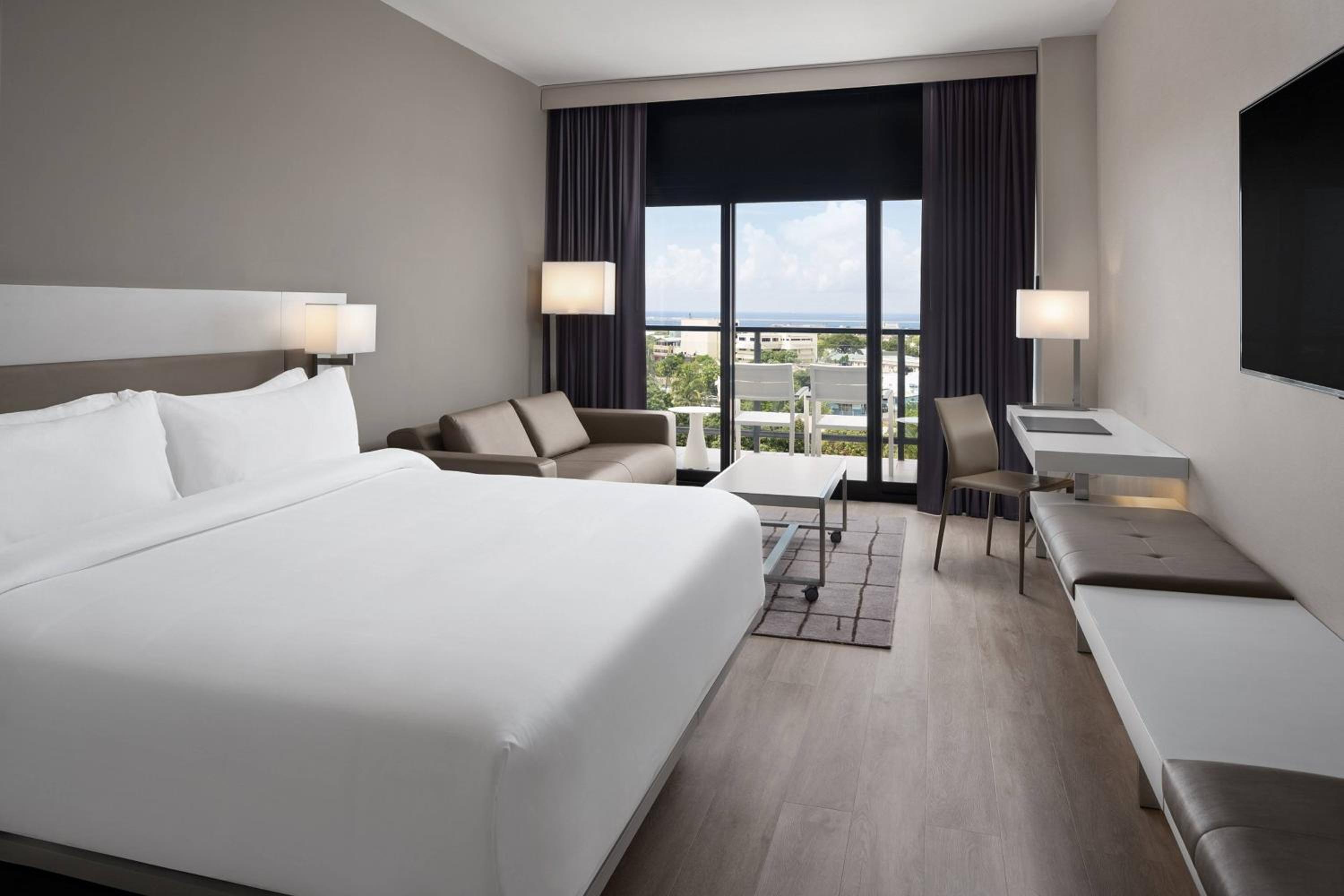 Larger Guest room, 1 King, Sofa bed, Balcony
