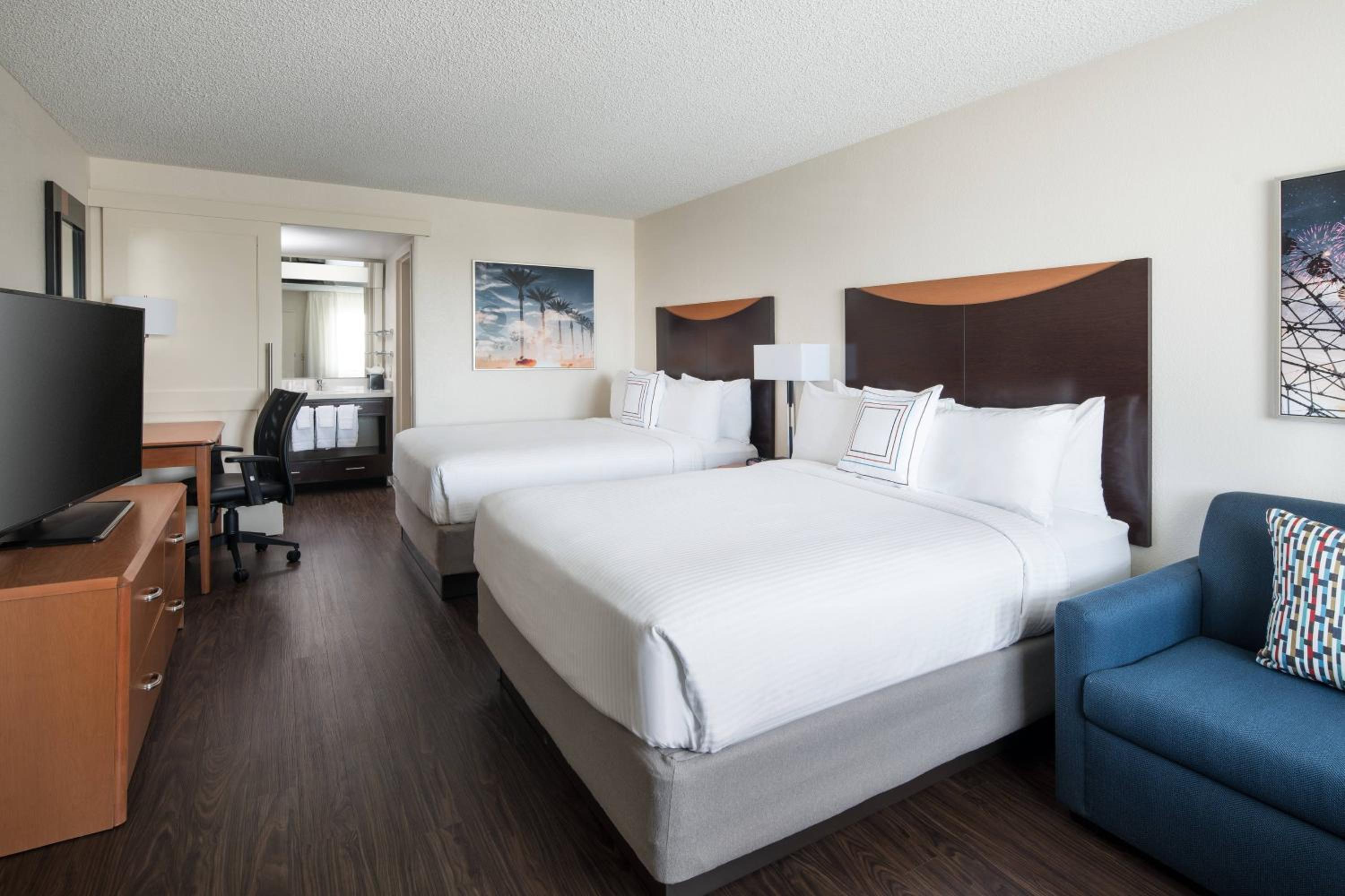 Queen Room with Two Queen Beds - Photo 1