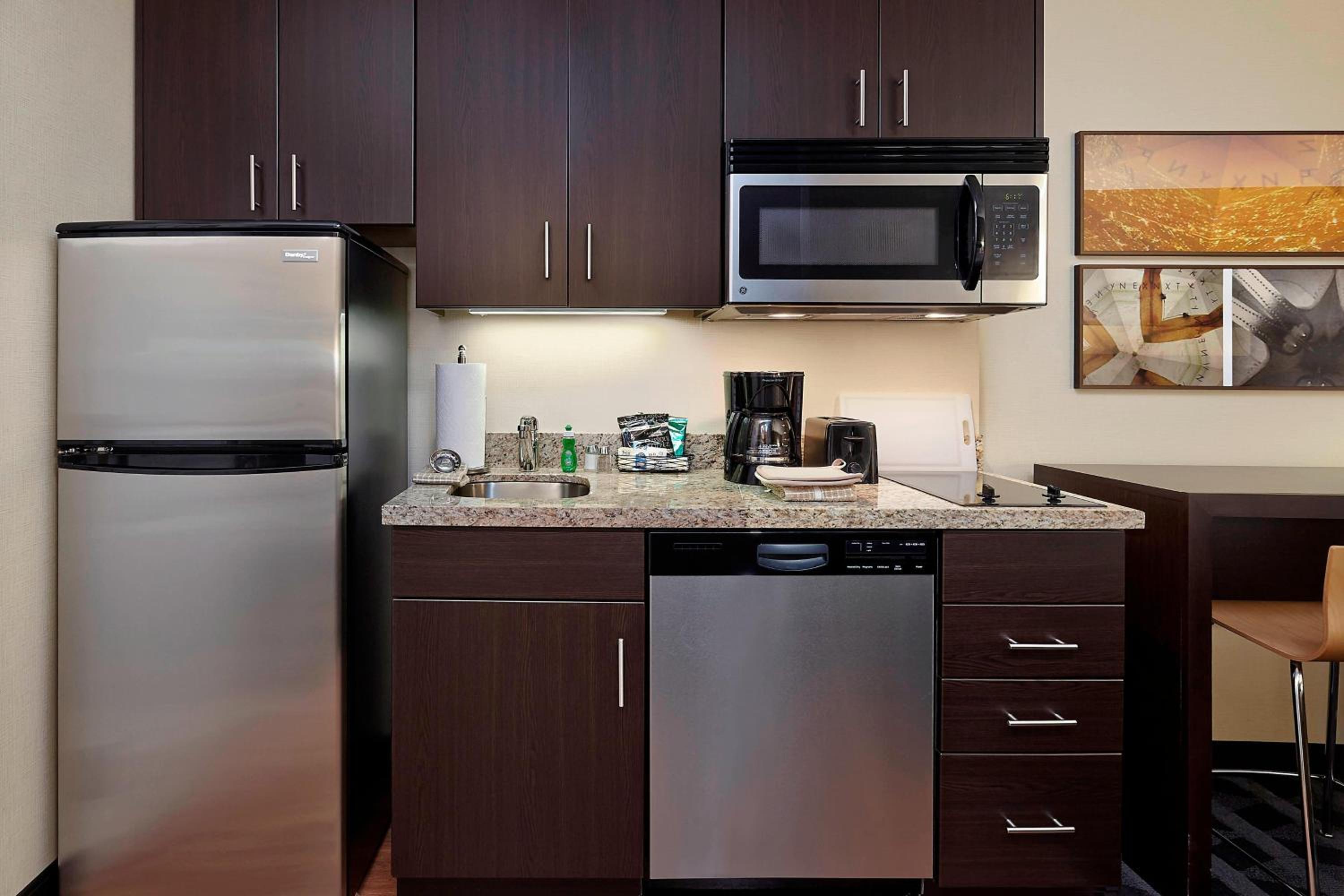kitchen with a stainless steel refrigerator and dishwasher