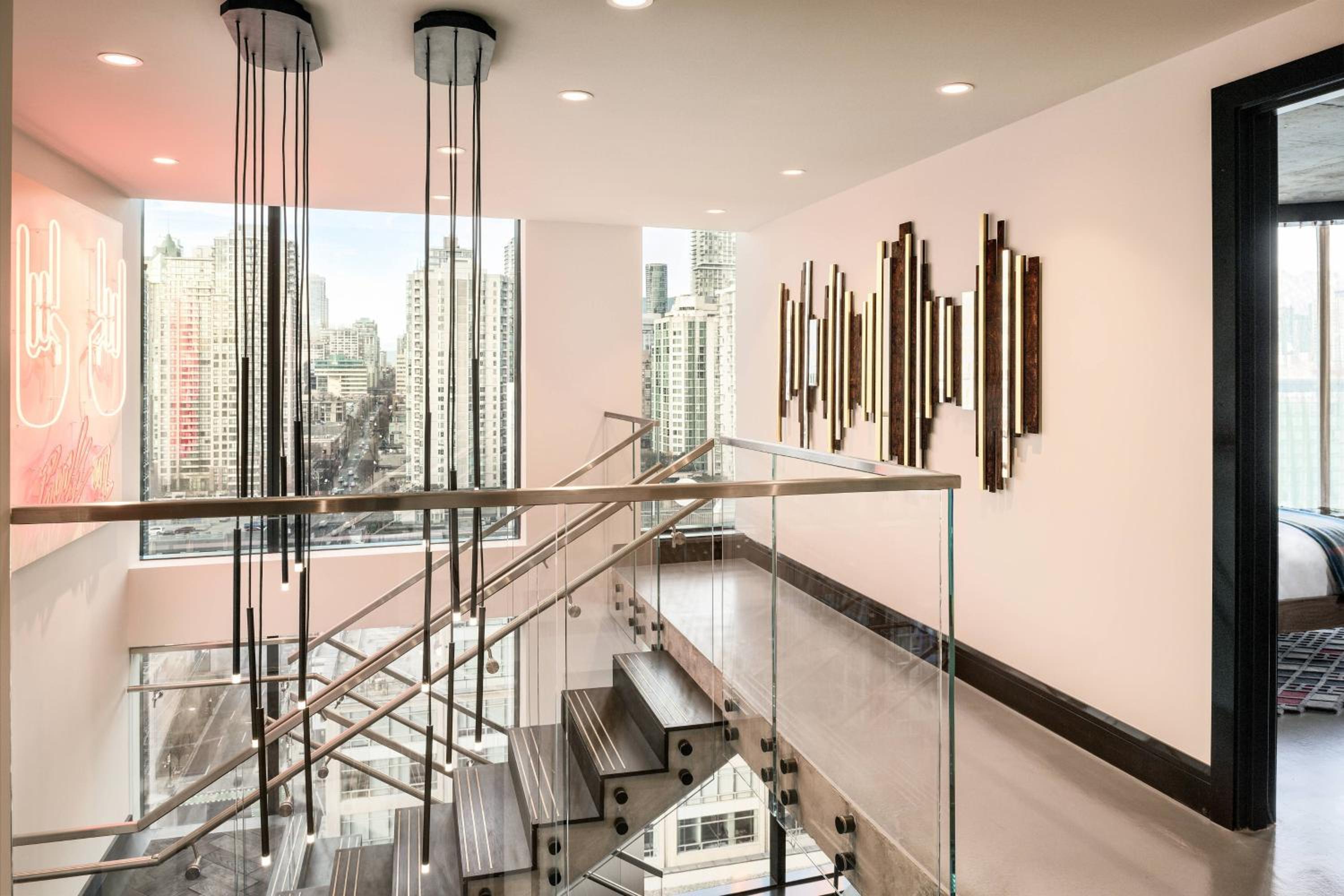 Two-Bedroom Bi-Level Suite with Fireplace - High Floor thumbnail 5