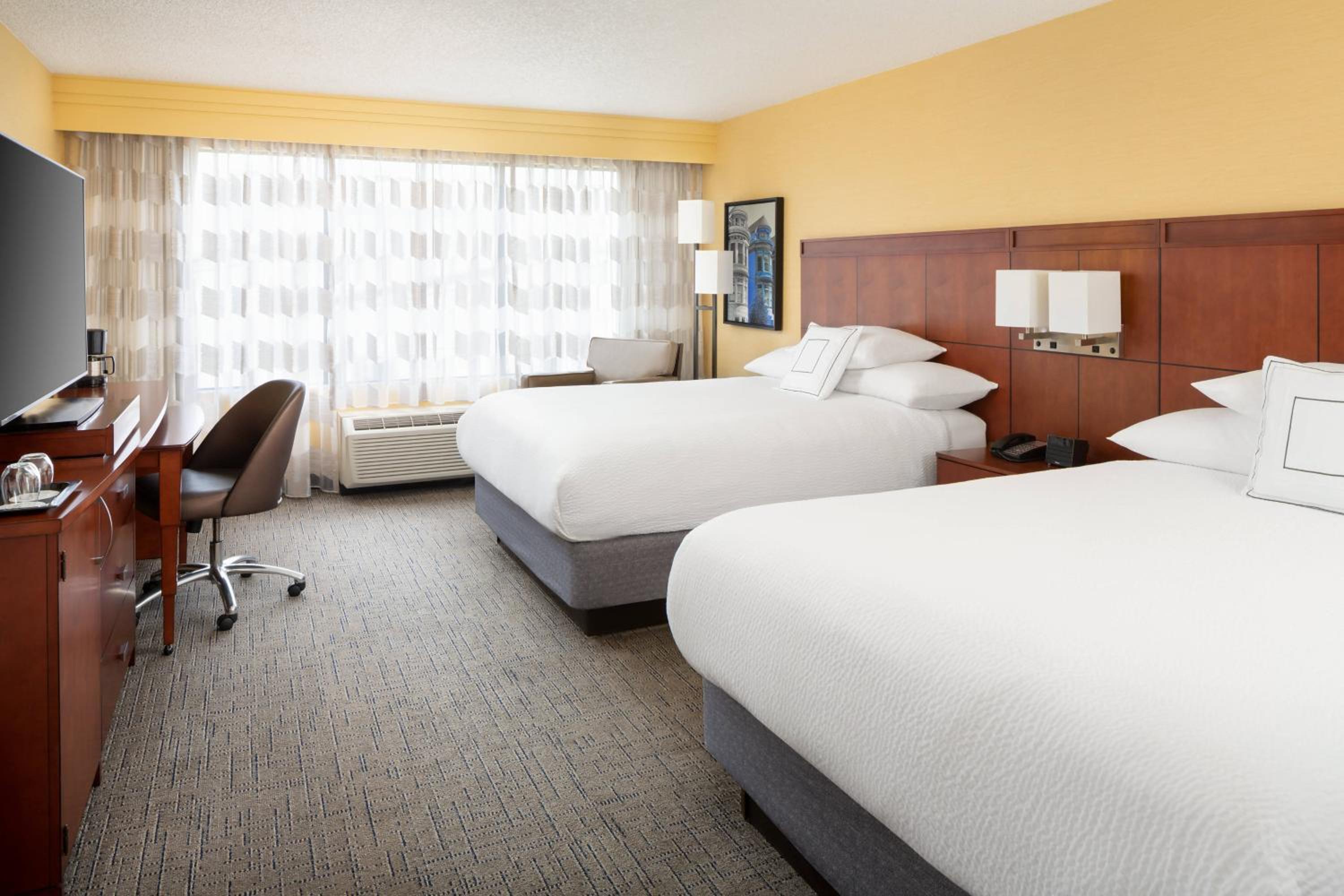 Queen Room with Two Queen Beds - Photo 1