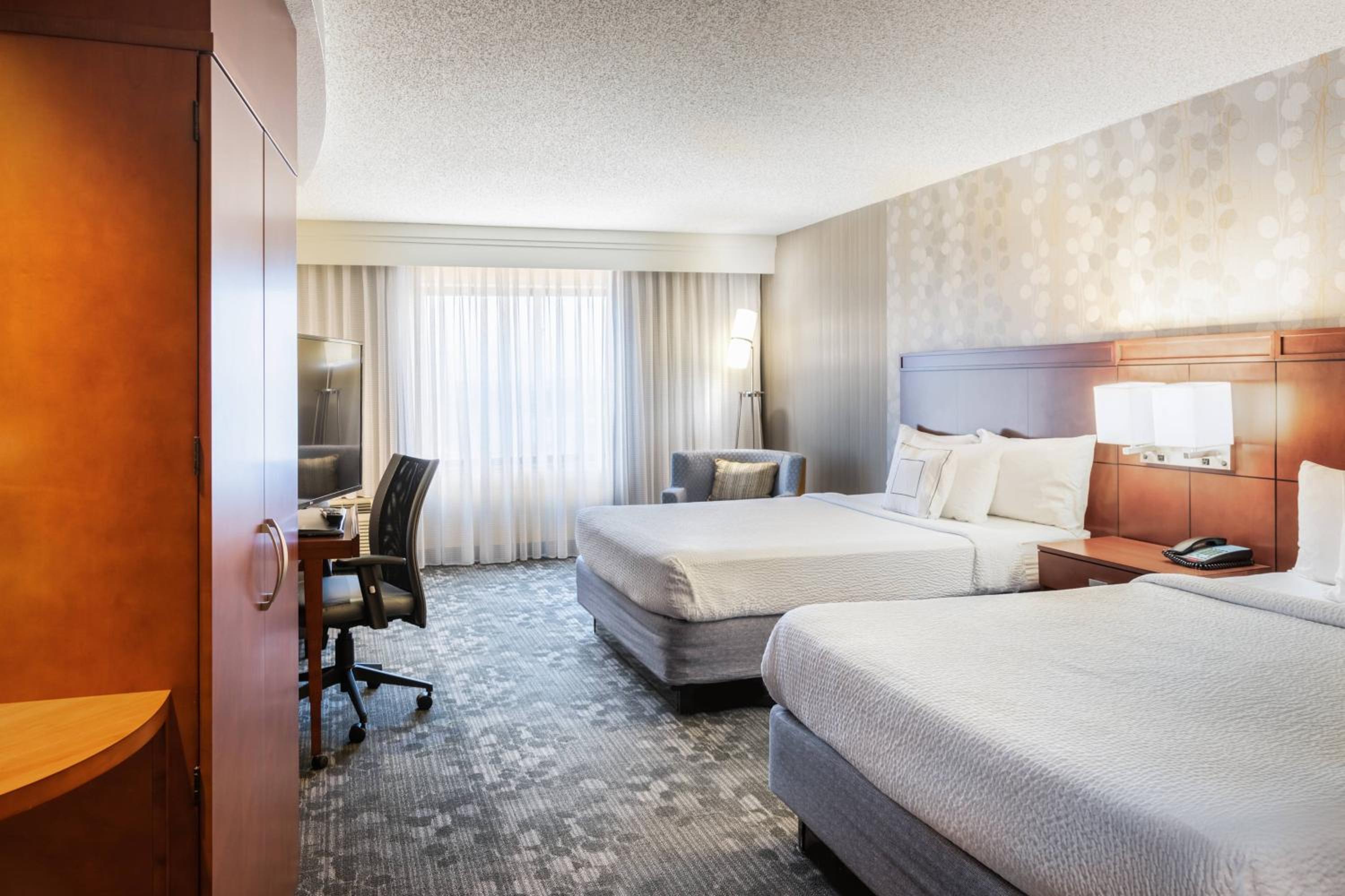 Queen Room with Two Queen Beds - Photo 1
