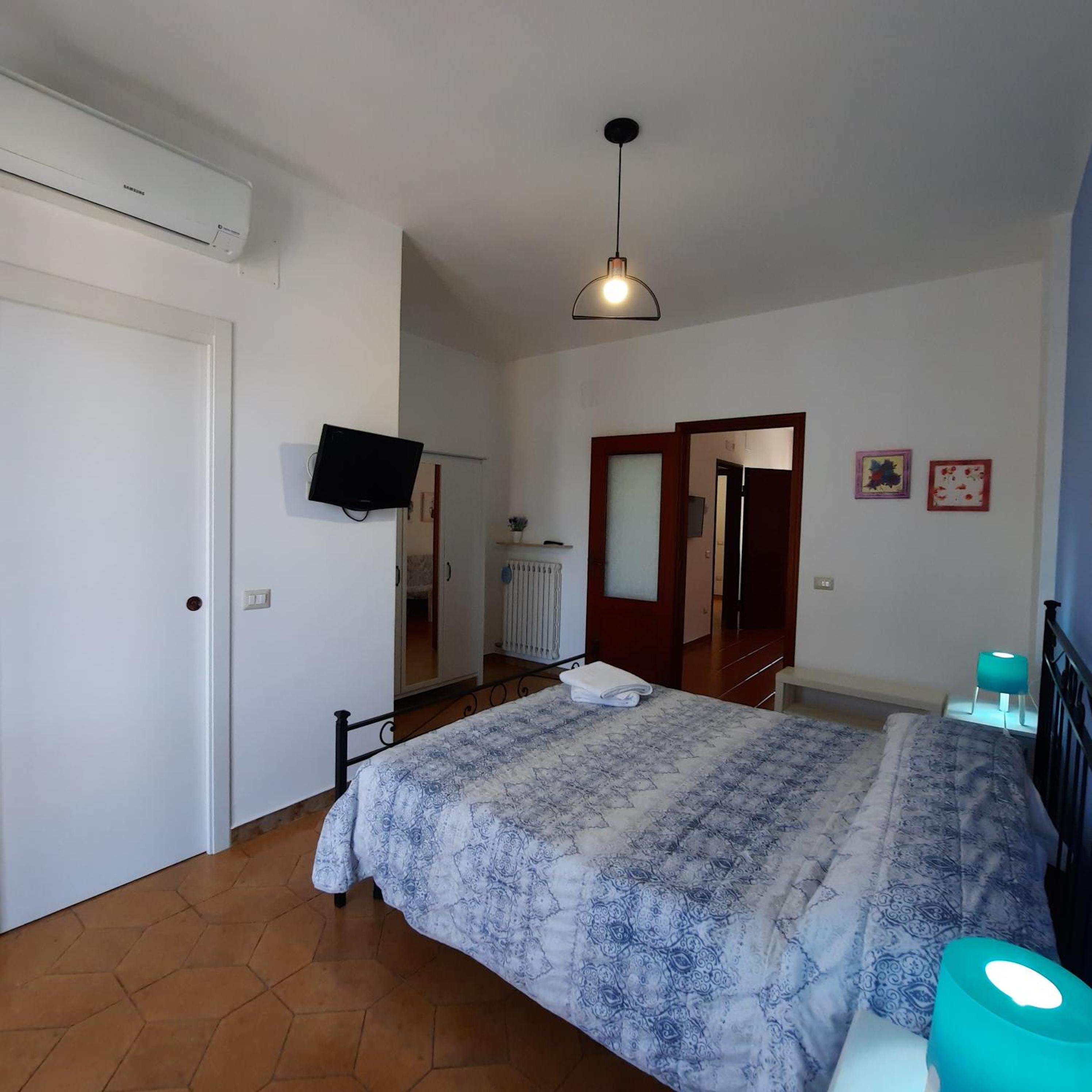 One-Bedroom Apartment with Balcony and City View