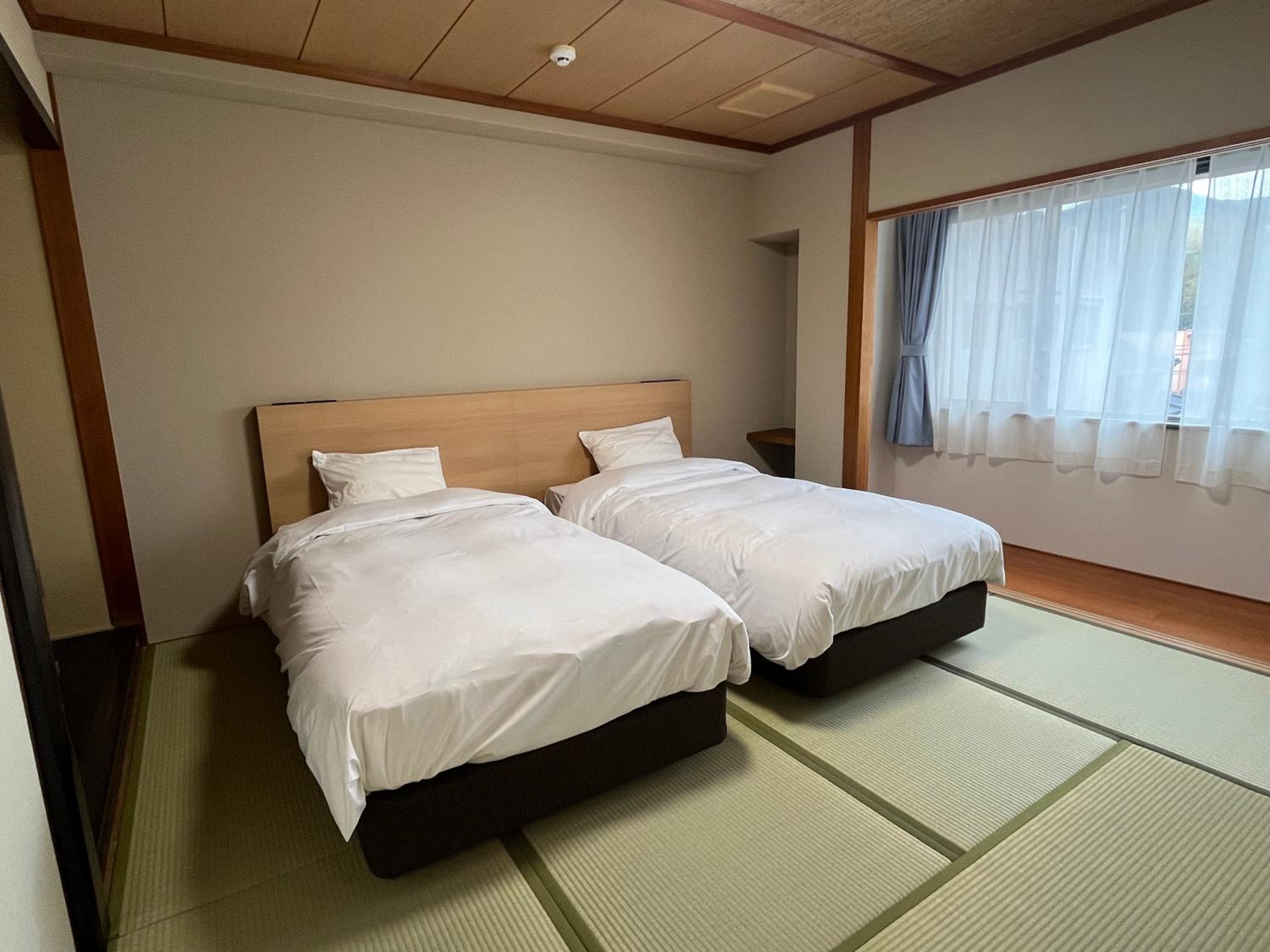 Standard Twin Room - Photo 1