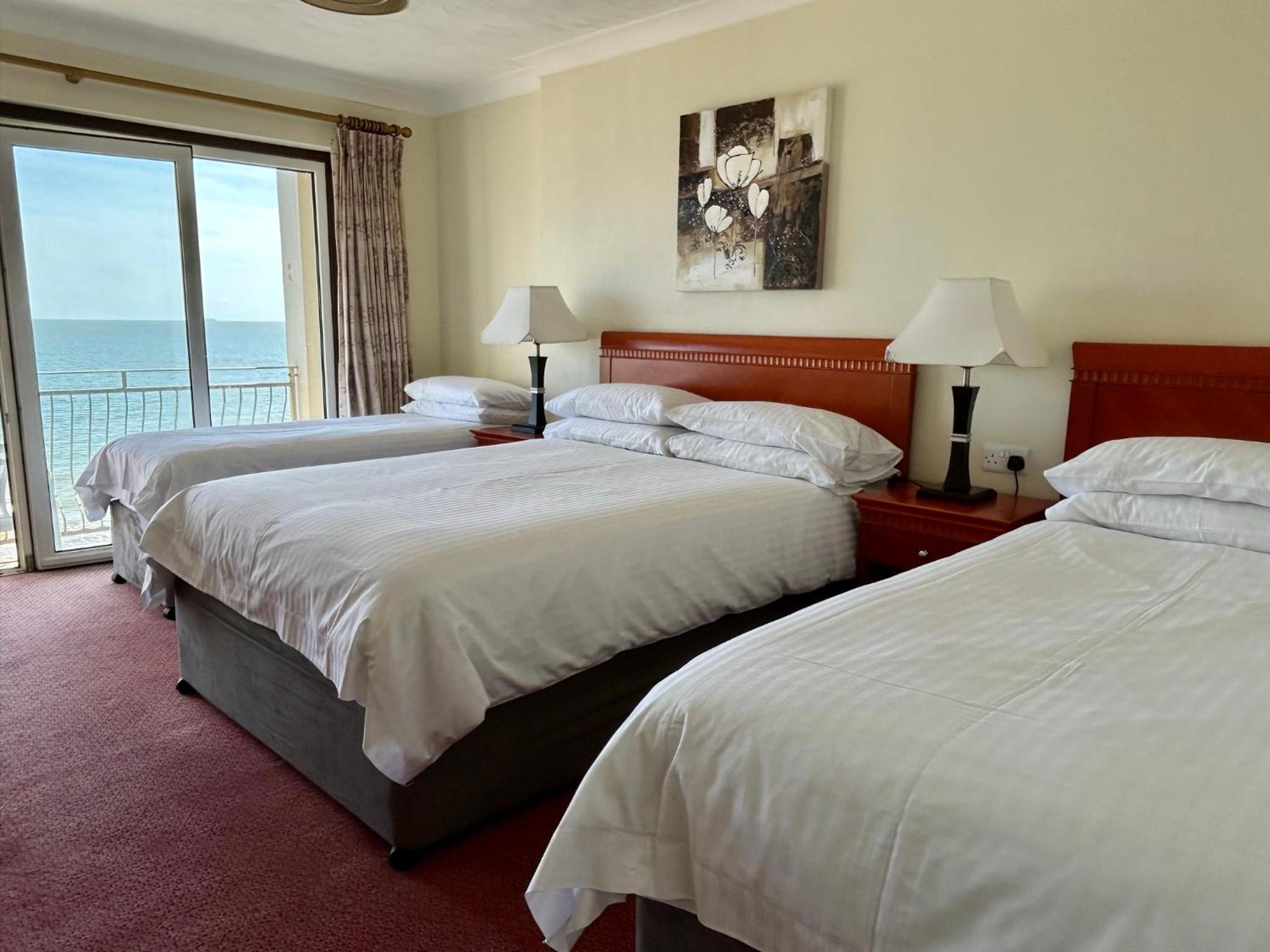 Family Room with Balcony and Sea View ( 2 Adults + 4 Children)