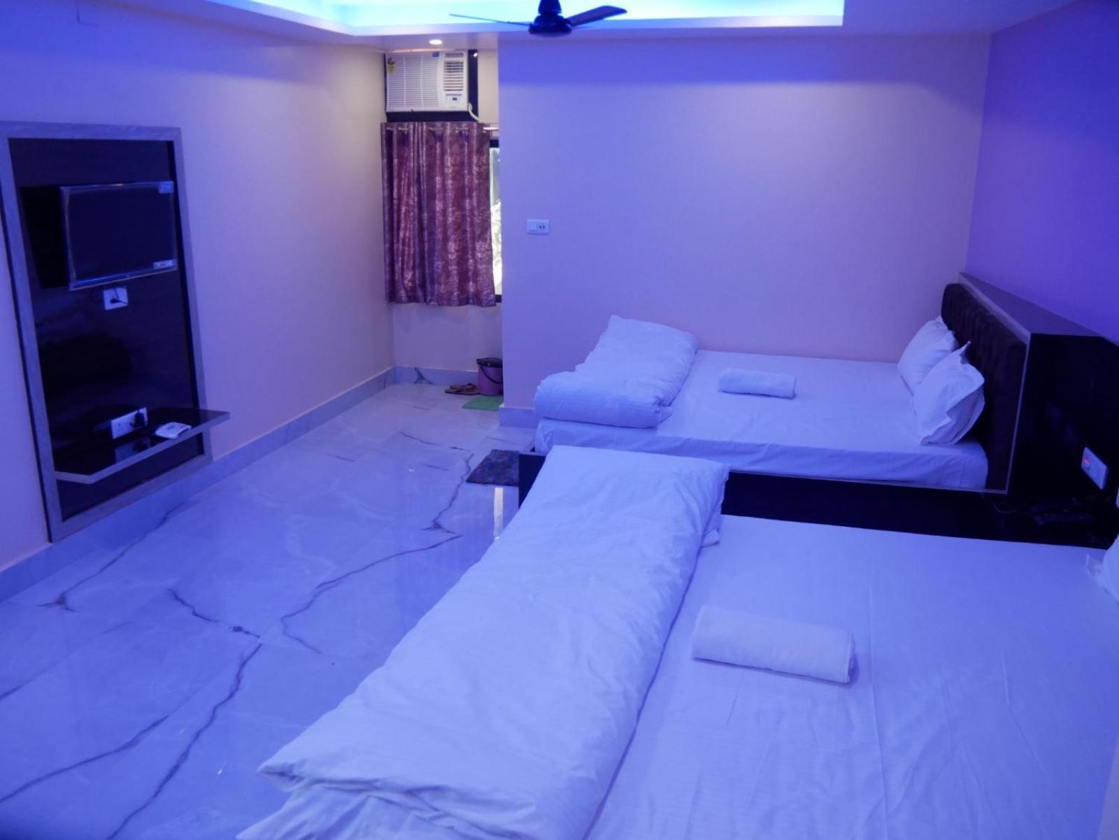 Deluxe Quadruple Room - Photo 8