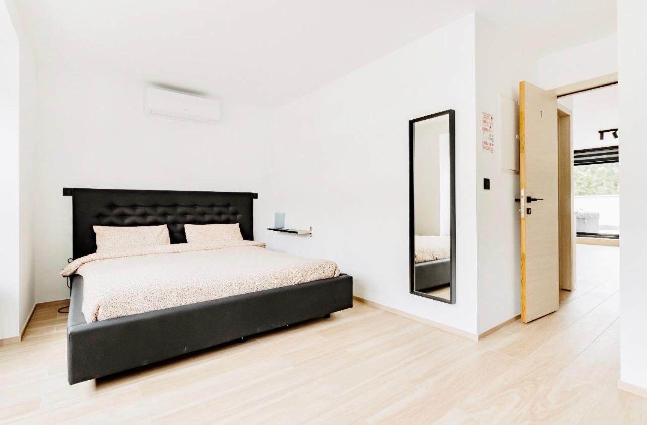 Three-Bedroom Apartment - Photo 12
