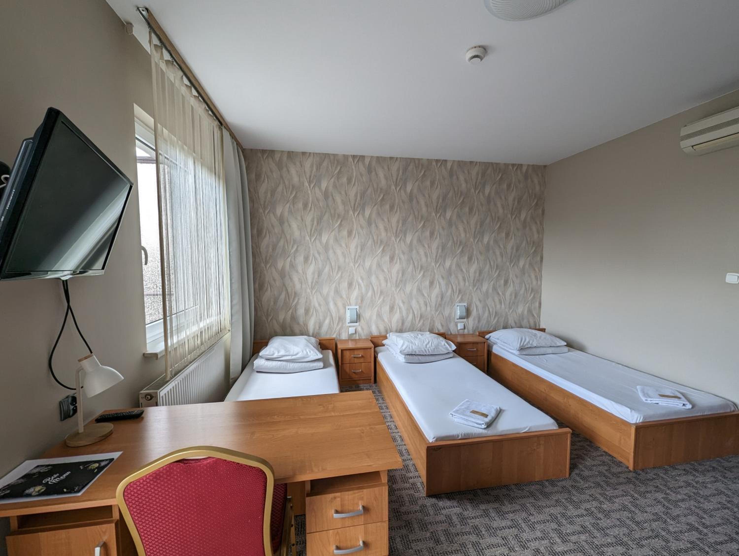 Triple Room with Private Bathroom - Photo 1
