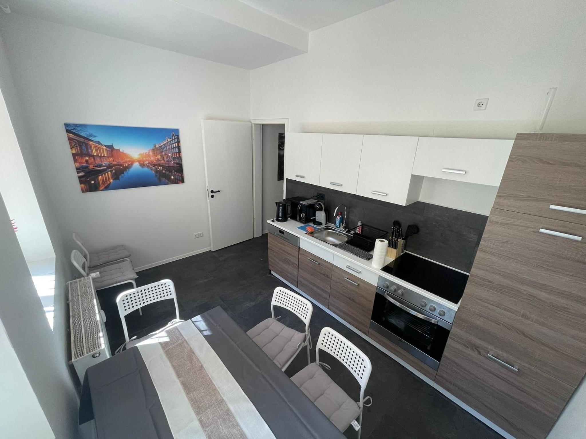 Three-Bedroom Apartment photo 2