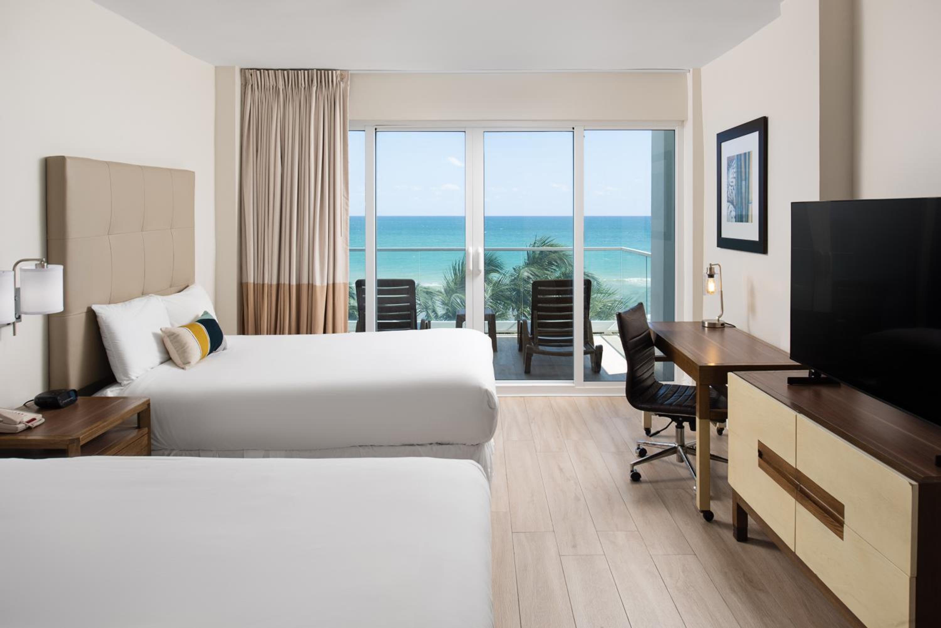 Deluxe Oceanfront Double Beds with Balcony - Photo 1