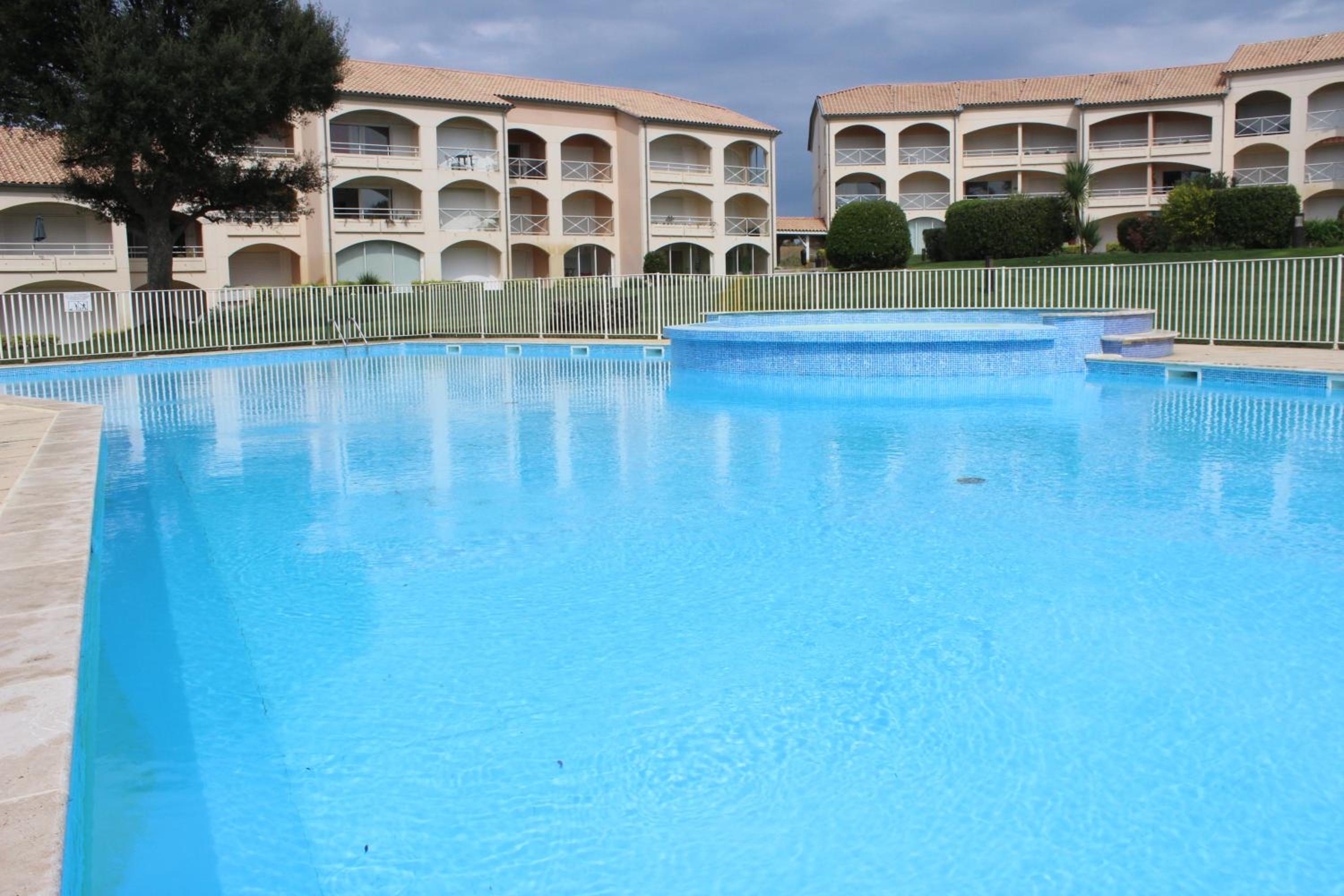 One-Bedroom Apartment with Pool View