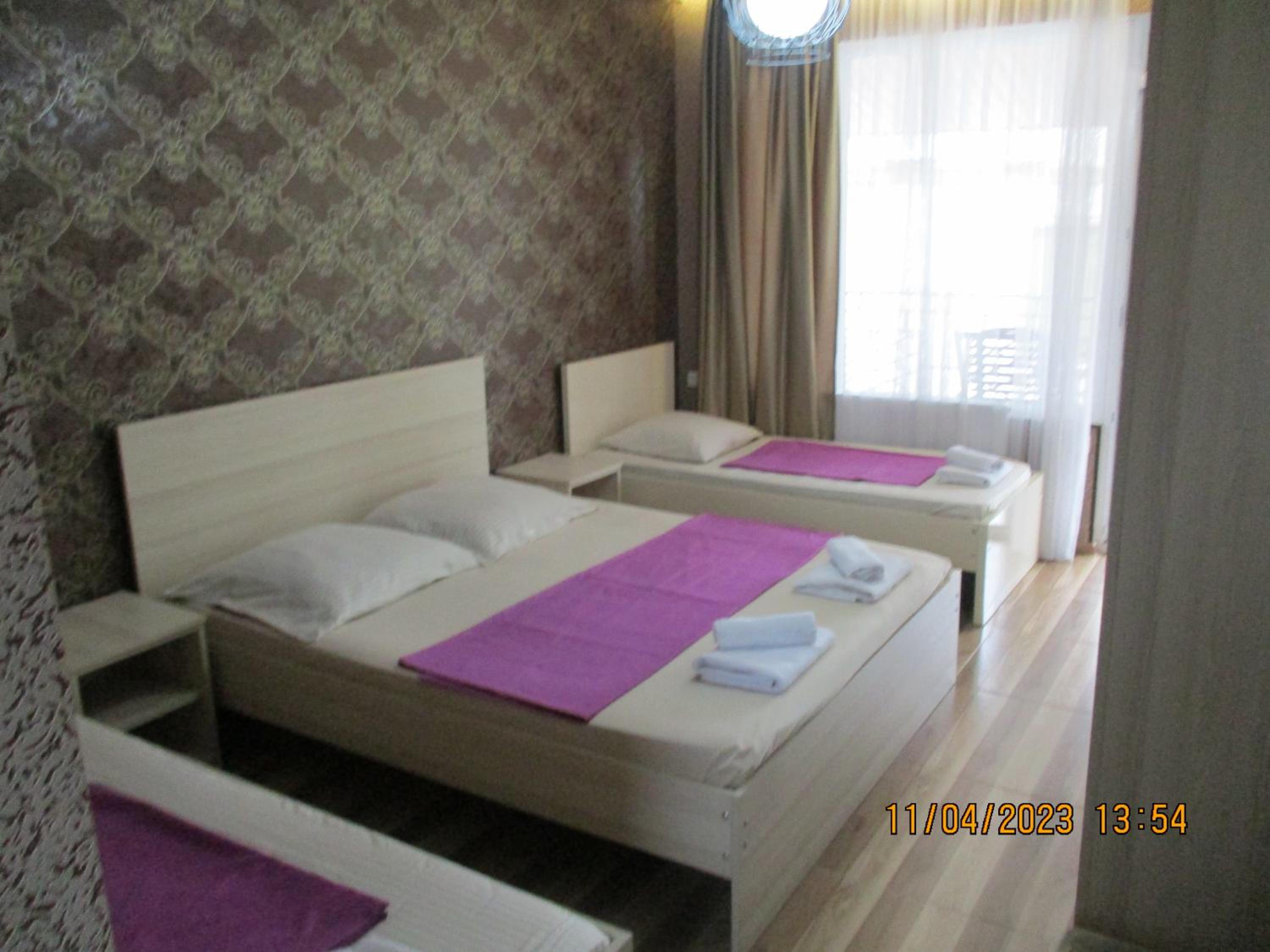 Quadruple Room with Private Bathroom photo 2