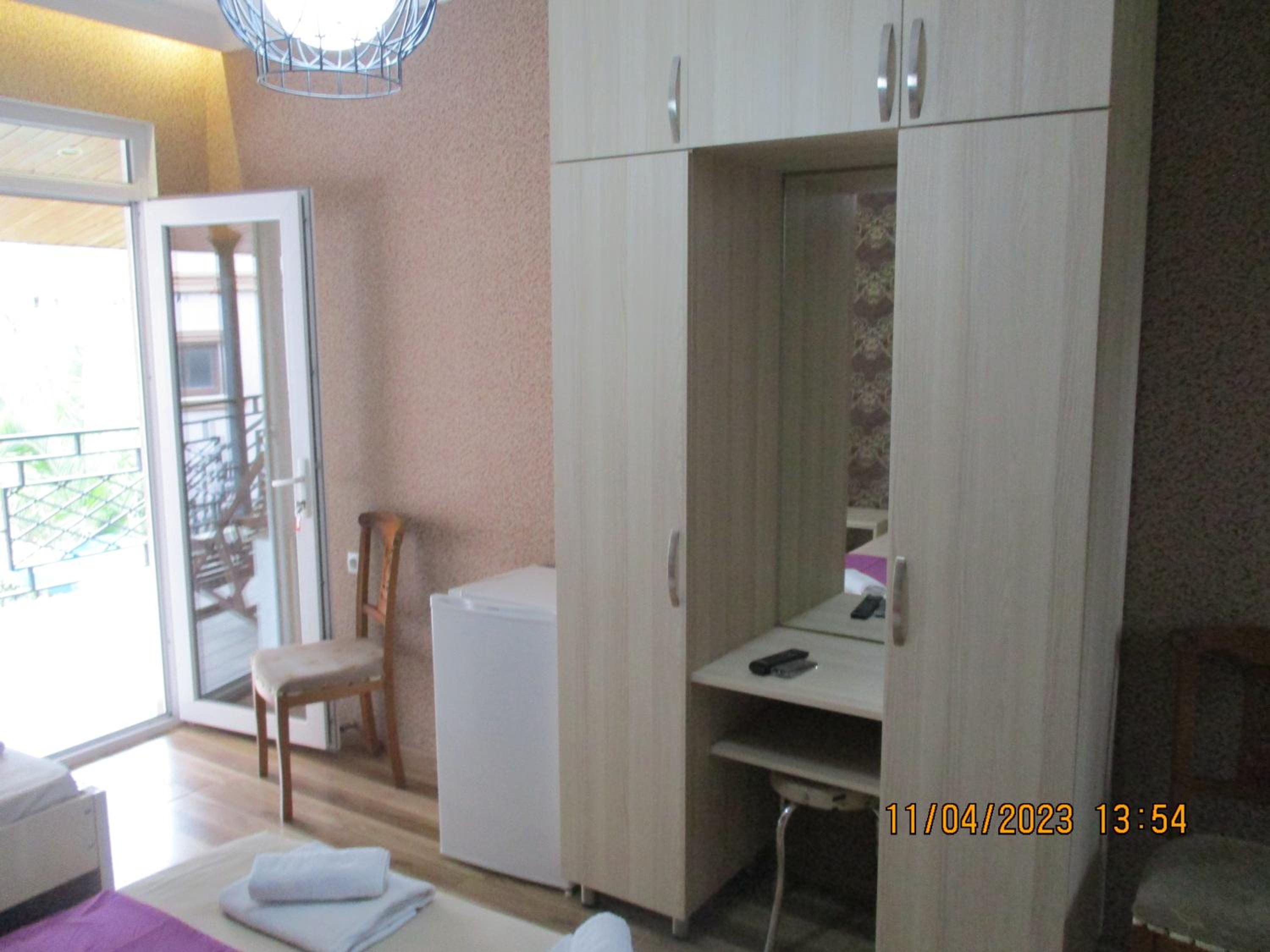 Quadruple Room with Private Bathroom photo 3