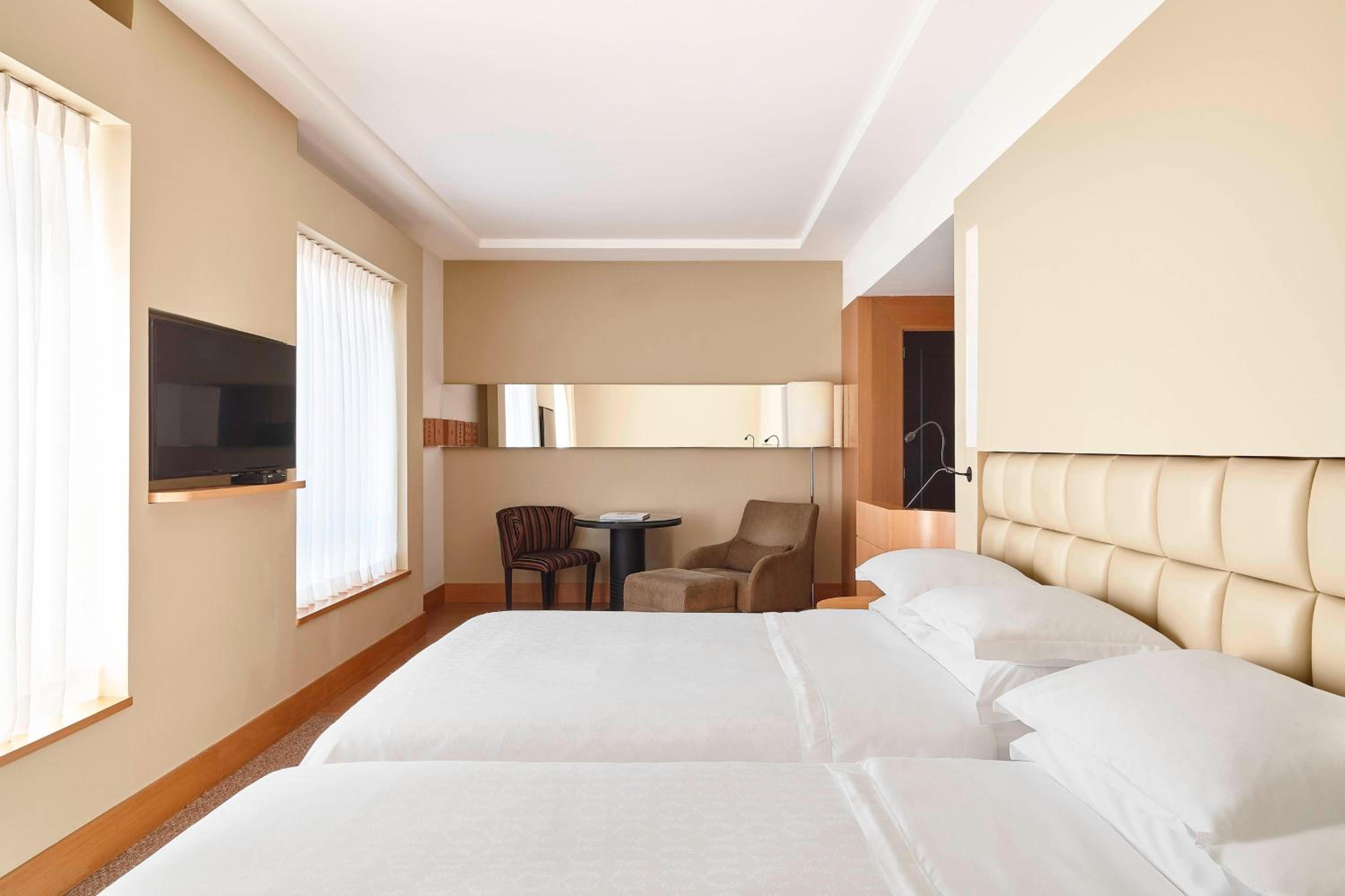 Deluxe Queen Room with Two Queen Beds - Photo 1