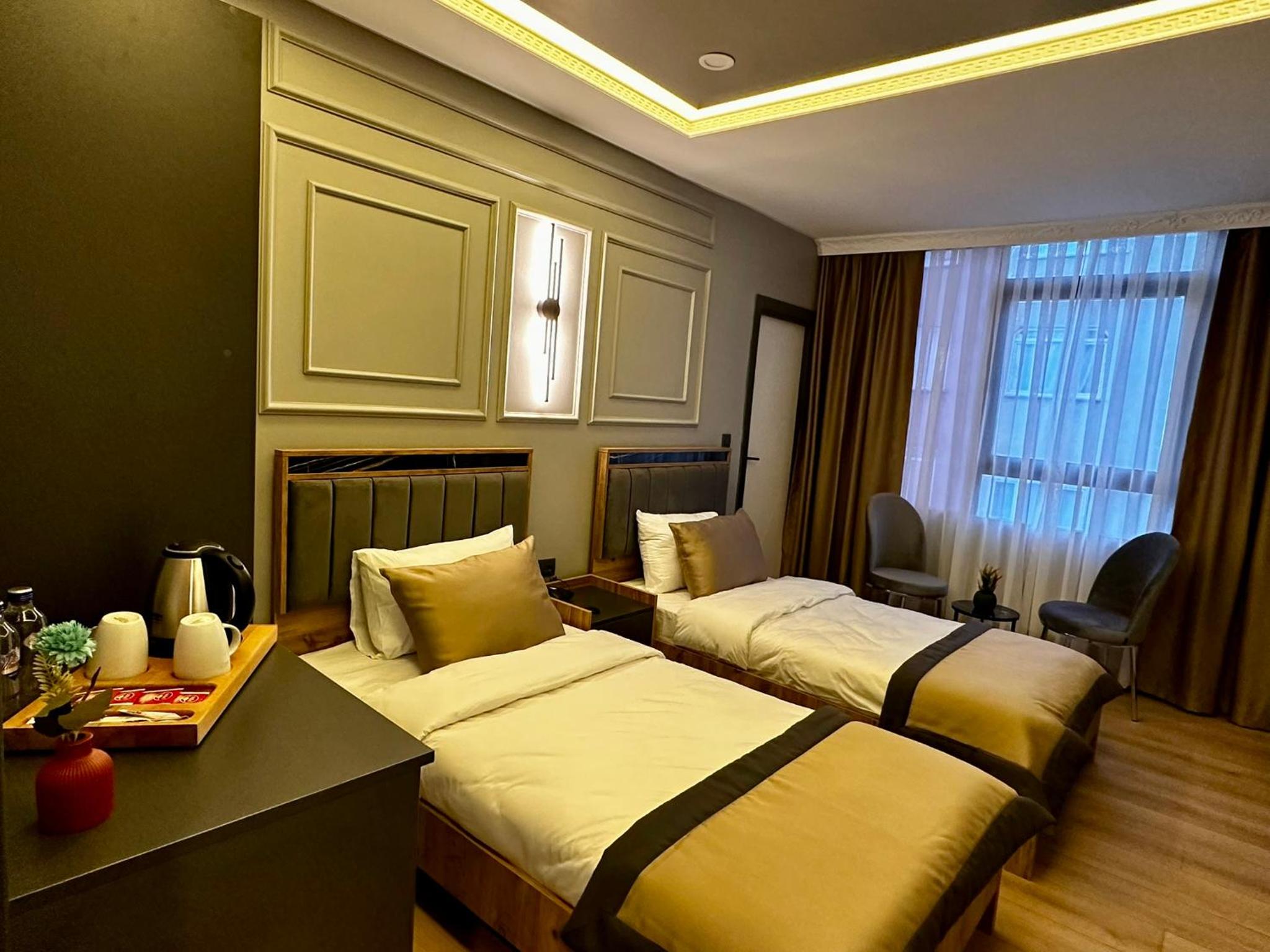 Standard Twin Room - Photo 4